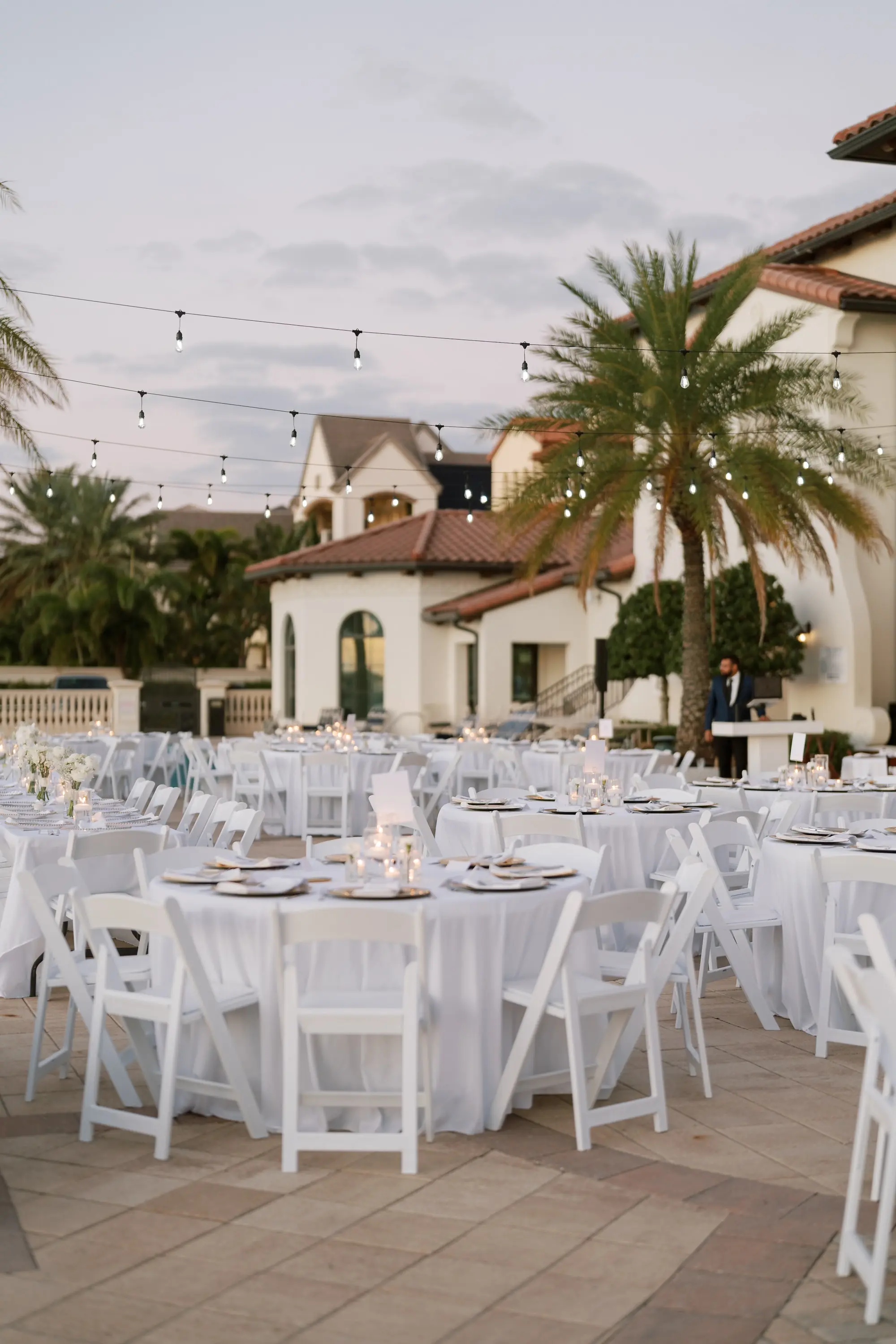 Romantic White and Gold Waterfront Wedding Reception Decor Inspiration | White Folding Garden Chairs | Tampa Bay Event Venue Westshore Yacht Club