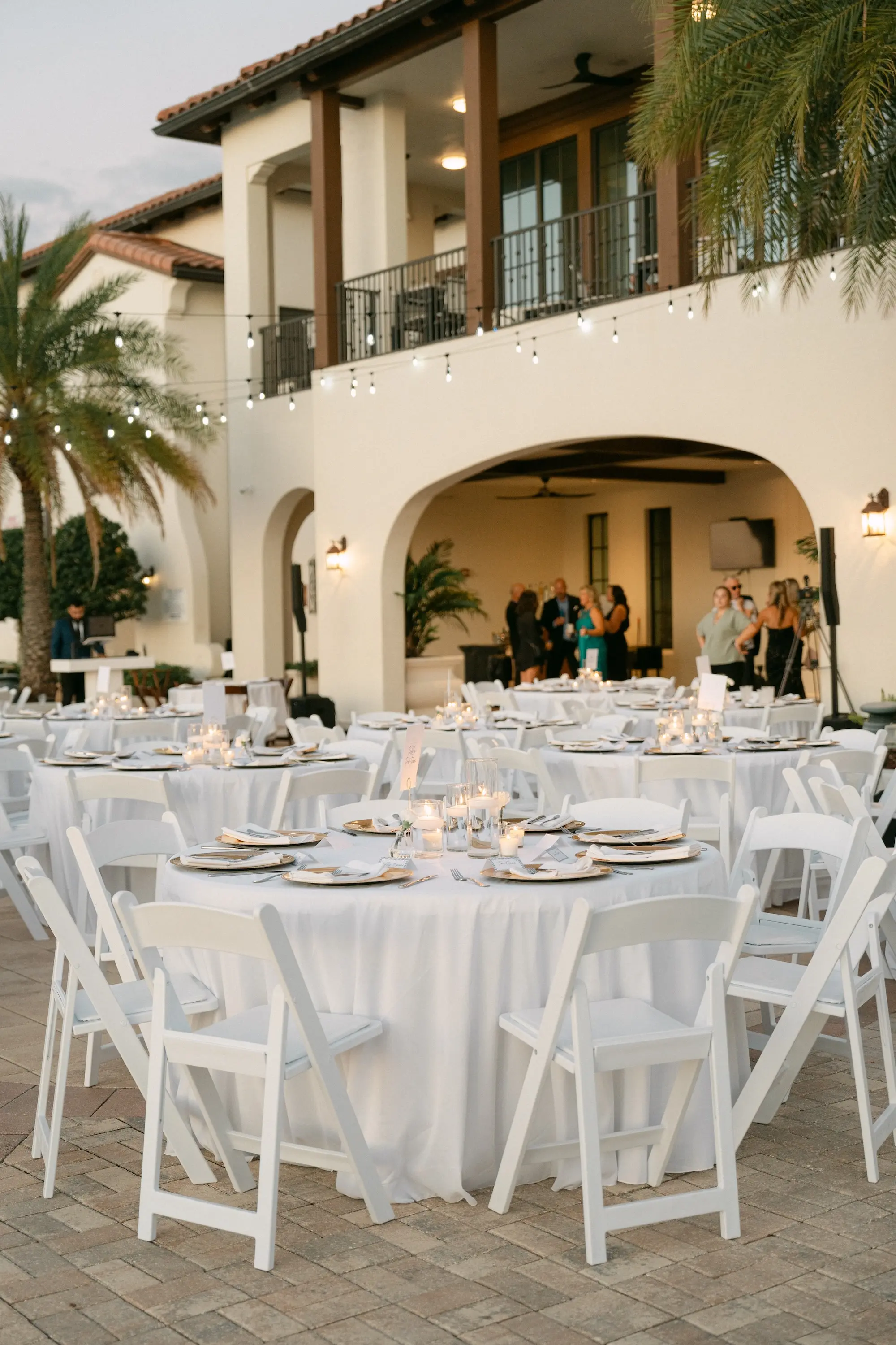 Romantic White and Gold Waterfront Wedding Reception Decor Inspiration | White Folding Garden Chairs | Tampa Bay Event Venue Westshore Yacht Club