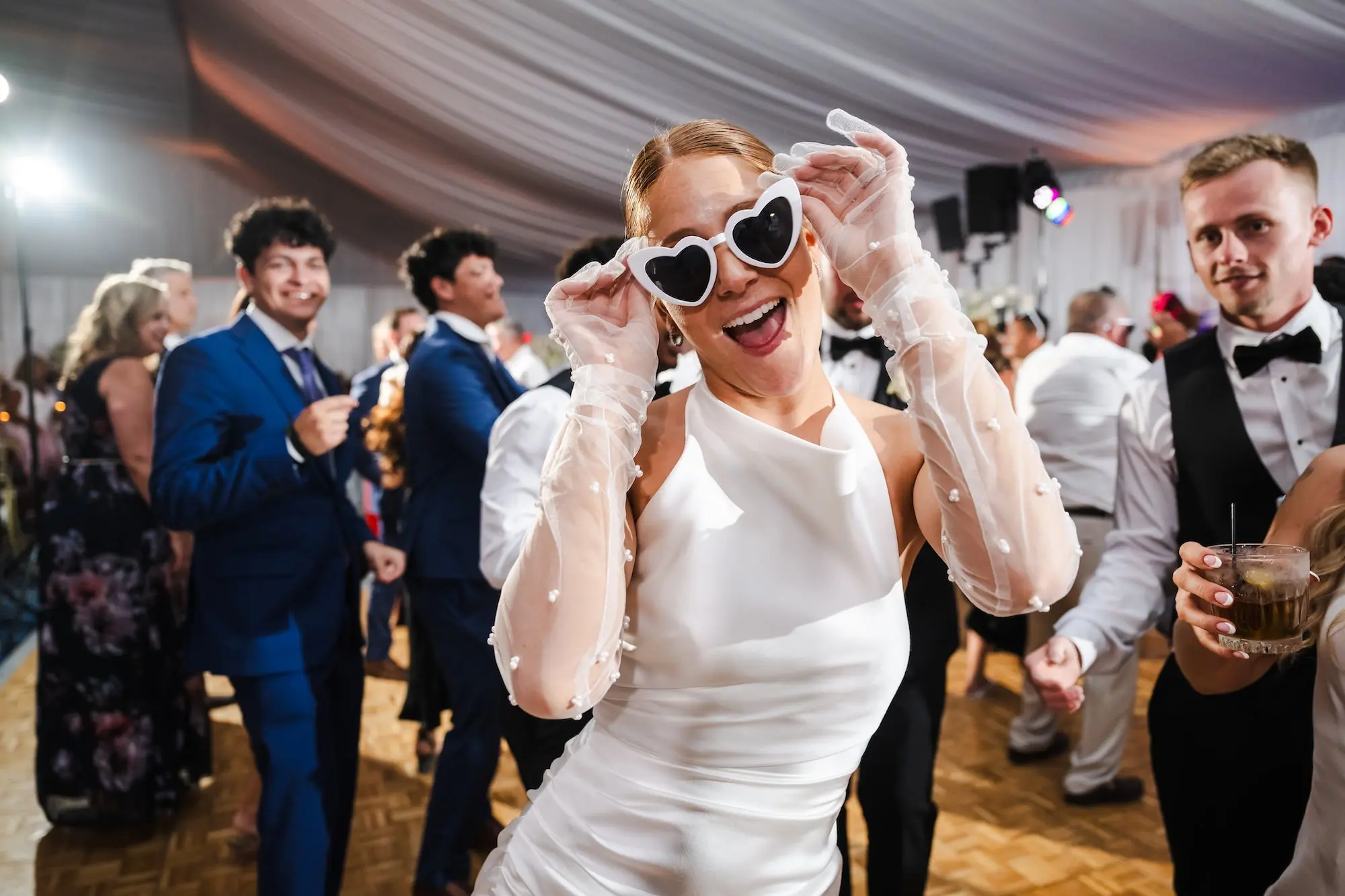 Bride in White Heart Sunglasses Wedding Reception Portrait | Tampa Bay Photographer Iyrus Weddings