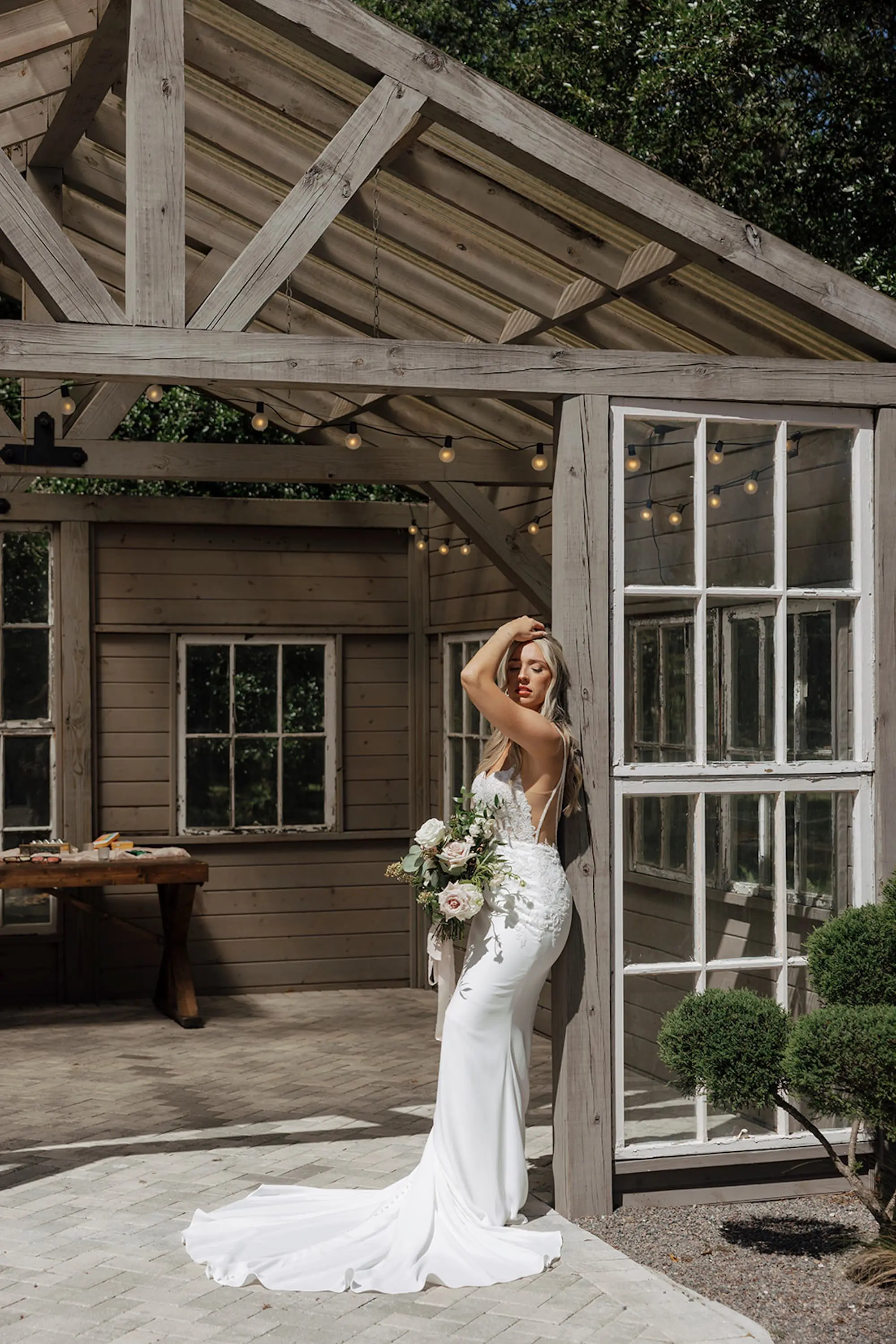 Bride Wedding Portrait | White Fitted Intricate Lace White Closet Bridal Crepe Sheath Wedding Gown with Spaghetti Straps Inspiration | Half Up Half Don Soft Natural Curls Bridal Hair Ideas | Feminine Natural Blush Bridal Makeup Inspiration | Sarasota Hair and Makeup Artist Femme Akoi Beauty Studio