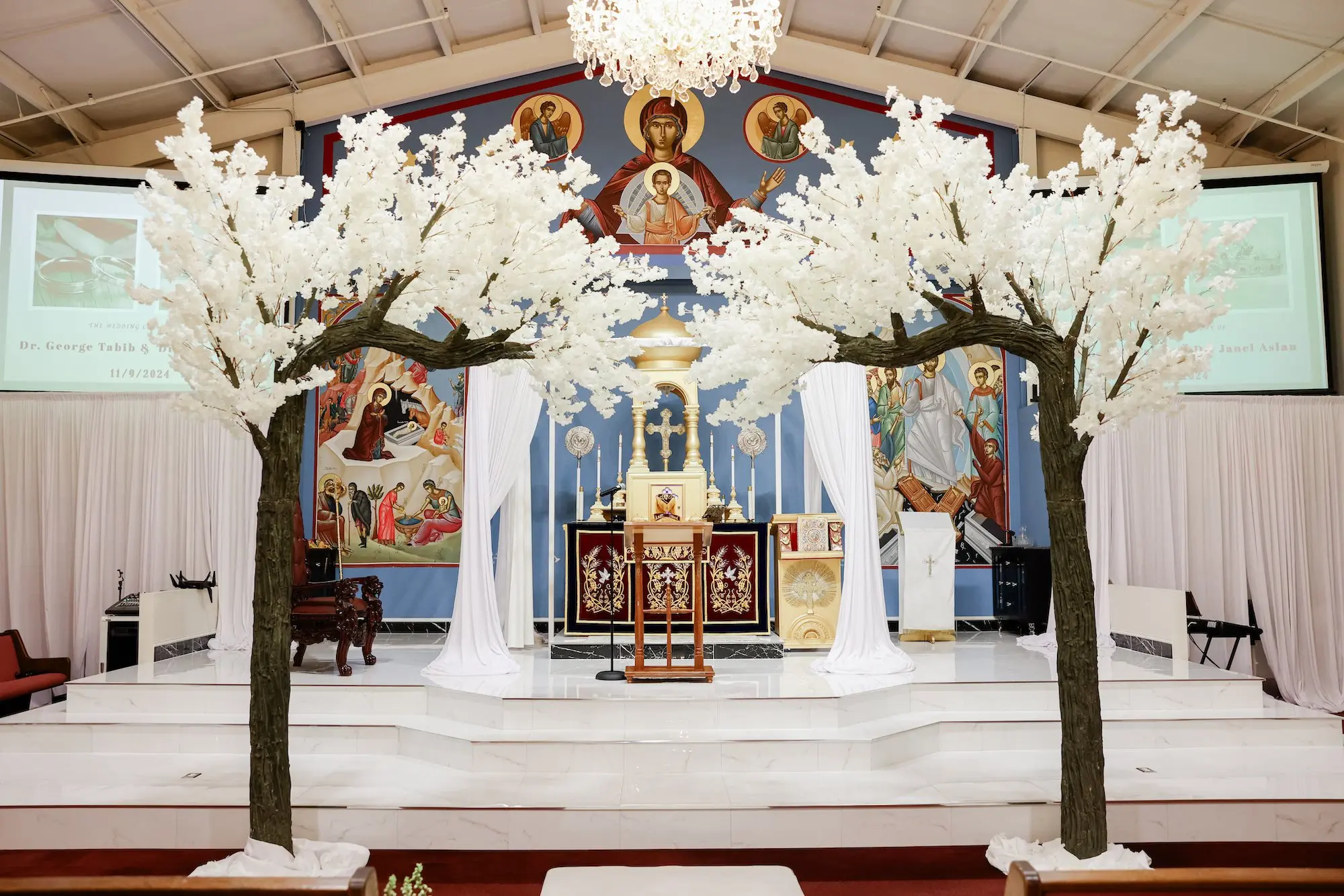 Luxurious White Wedding Ceremony Tree Arch Decor Inspiration | Tampa Bay Event Venue St Athanasius Syriac Orthodox Church