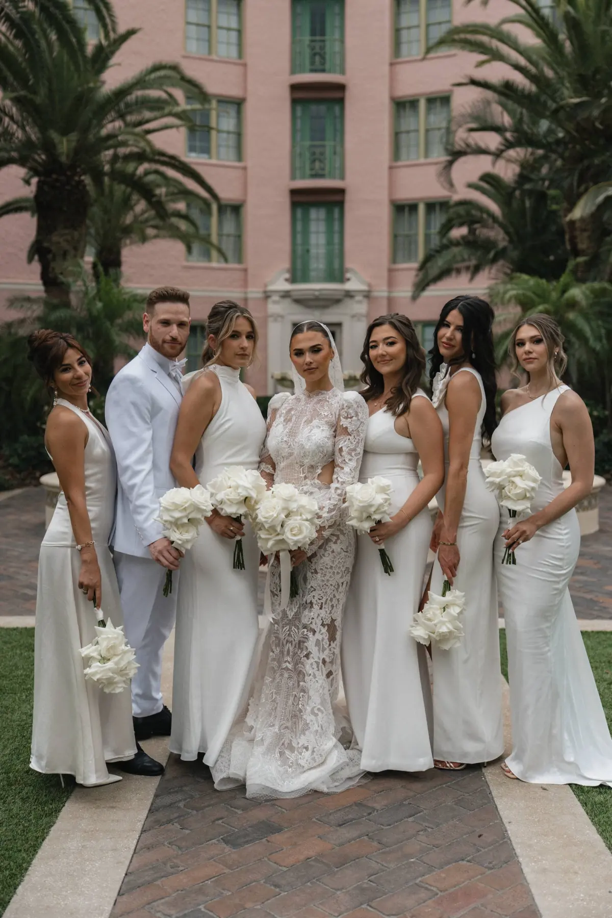 13Luxurious Ivory Neutral Ballroom Wedding Inspiration - “Best Of” 2025: Wedding Portraits Bride with Bridal Party Wedding Portrait | Mismatched White and Ivory Bridesmaid Dress Ideas
