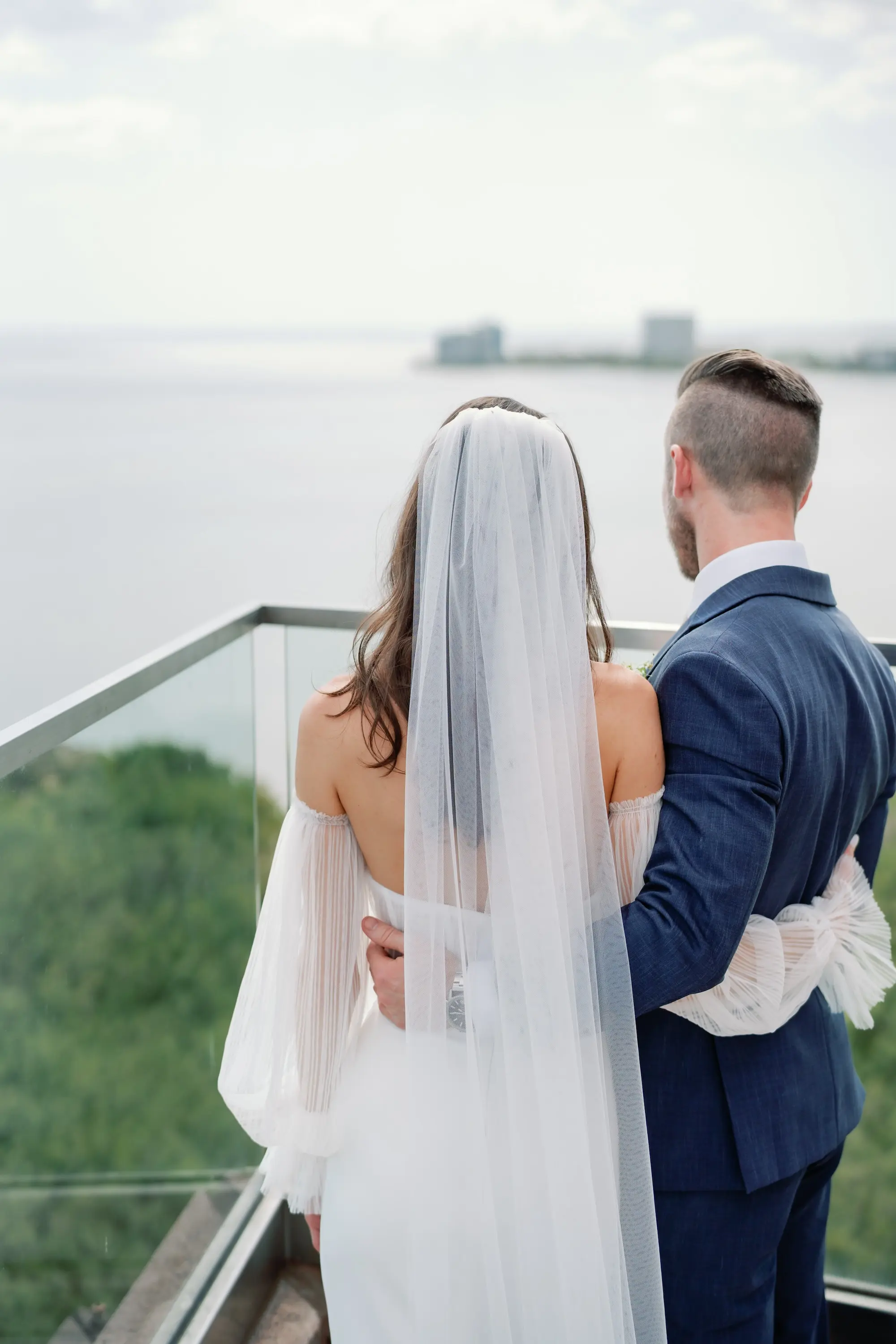 Bride and Groom Balcony Waterfront Wedding Portrait | Florida Event Venue Grand Hyatt Tampa Bay
