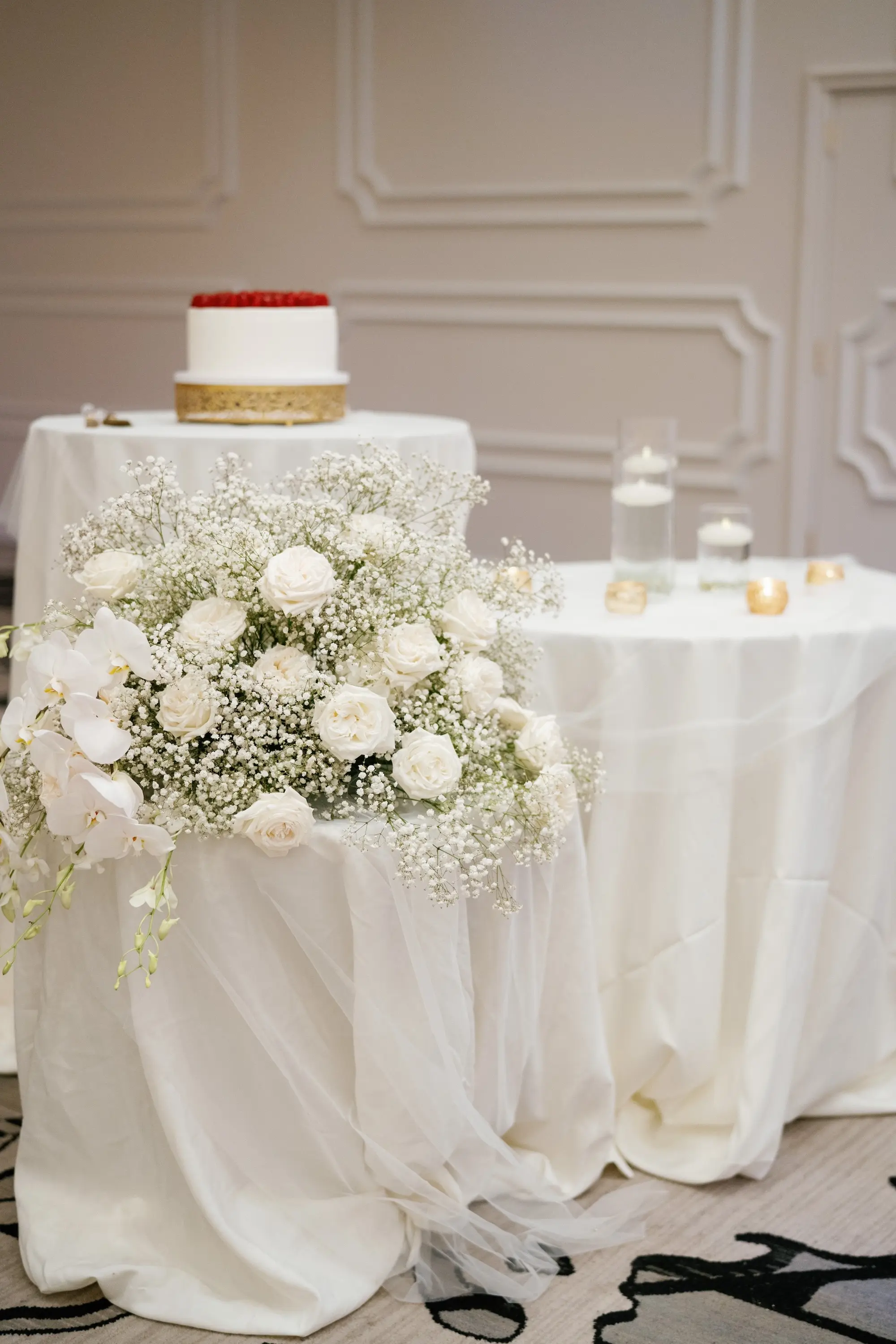 Timeless White Roses with Whites Baby's Breath Wedding Reception Flower Arrangement Decor Inspiration