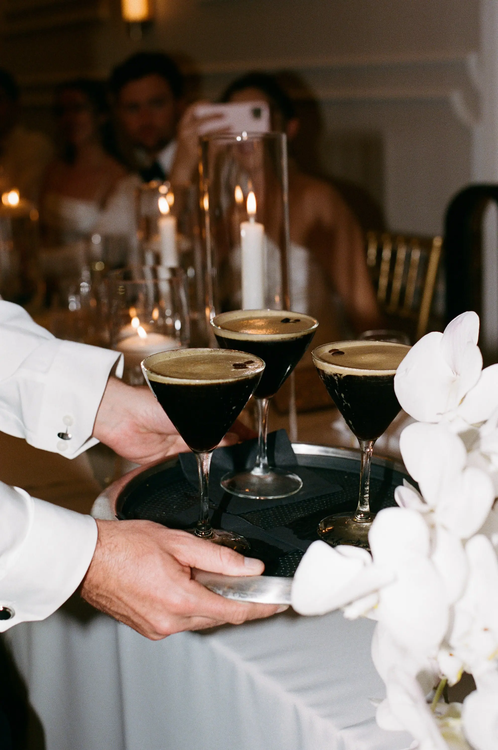 Glamourous Espresso Martini Wedding Reception Drinks Inspiration | White Florals with Romantic Candle Wedding Reception Tablescape Decor Ideas