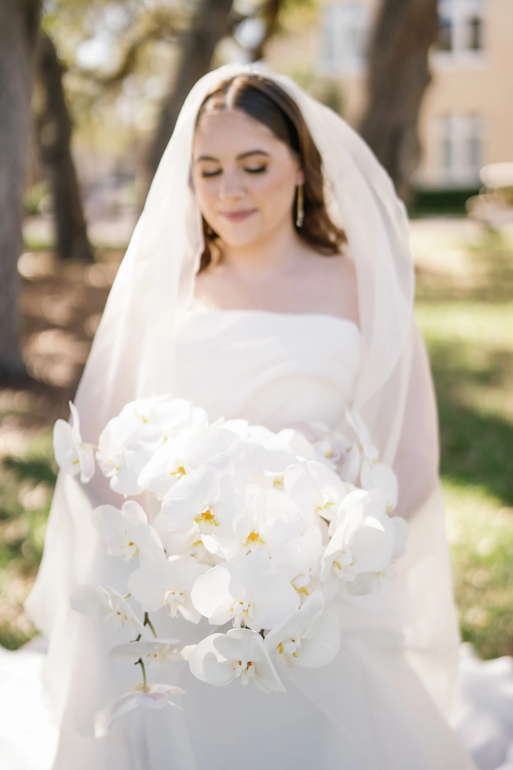 Bride Wedding Portrait | Traditional Chiffon Cathedral Length Wedding Veil Ideas | White Orchid Bridal Bouquet Inspiration