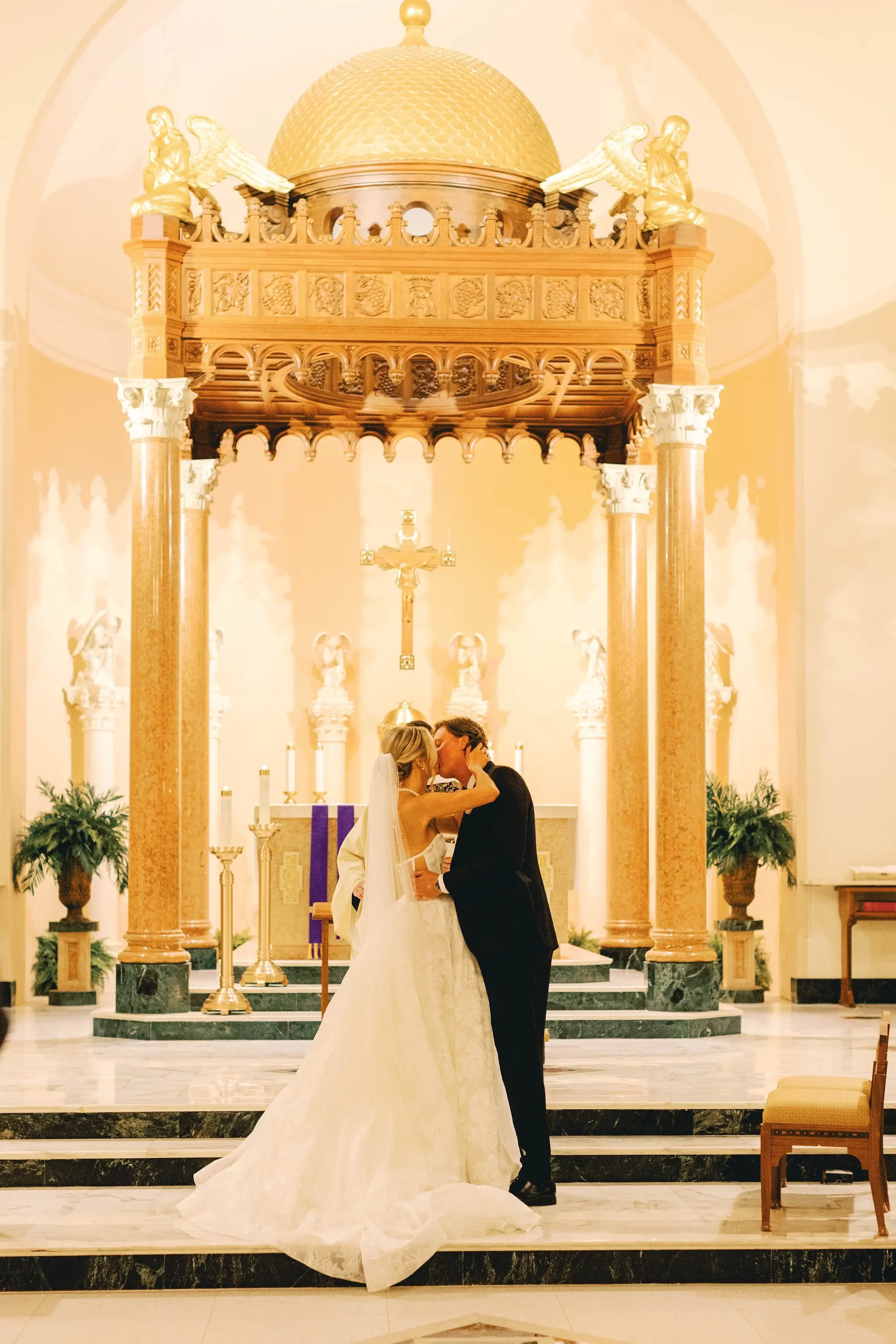 20Classic White and Green Wedding Ideas St. Mary Our Lady of Grace Church St Pete - Classic, White and Green St. Pete Wedding | The James Museum of Western & Wildlife Art Bride and Groom Wedding Ceremony Just Married Kiss Wedding Portrait | St Pete Catholic Church Wedding Venues Ideas | Wedding Ceremony Venue St. Mary Our Lady of Grace Catholic Church