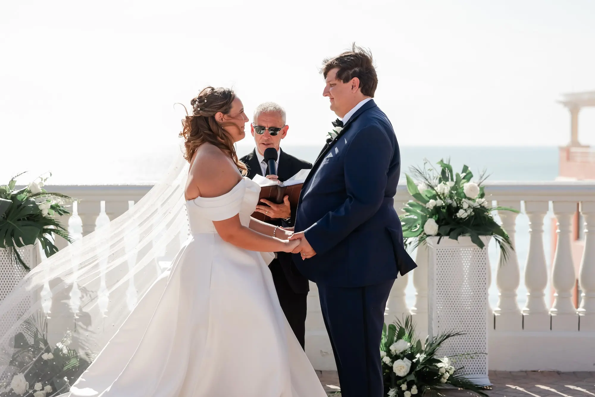 Bride and Groom Wedding Ceremony Vow Exchange Wedding | White and Green Wedding Ceremony Aisle Altar Aisle Decor Ideas | Tampa Bay Florist Save The Date Florida | Waterfront Wedding Venue Hyatt Regency Clearwater Beach | St Pete Photographer Lifelong Photography Studio