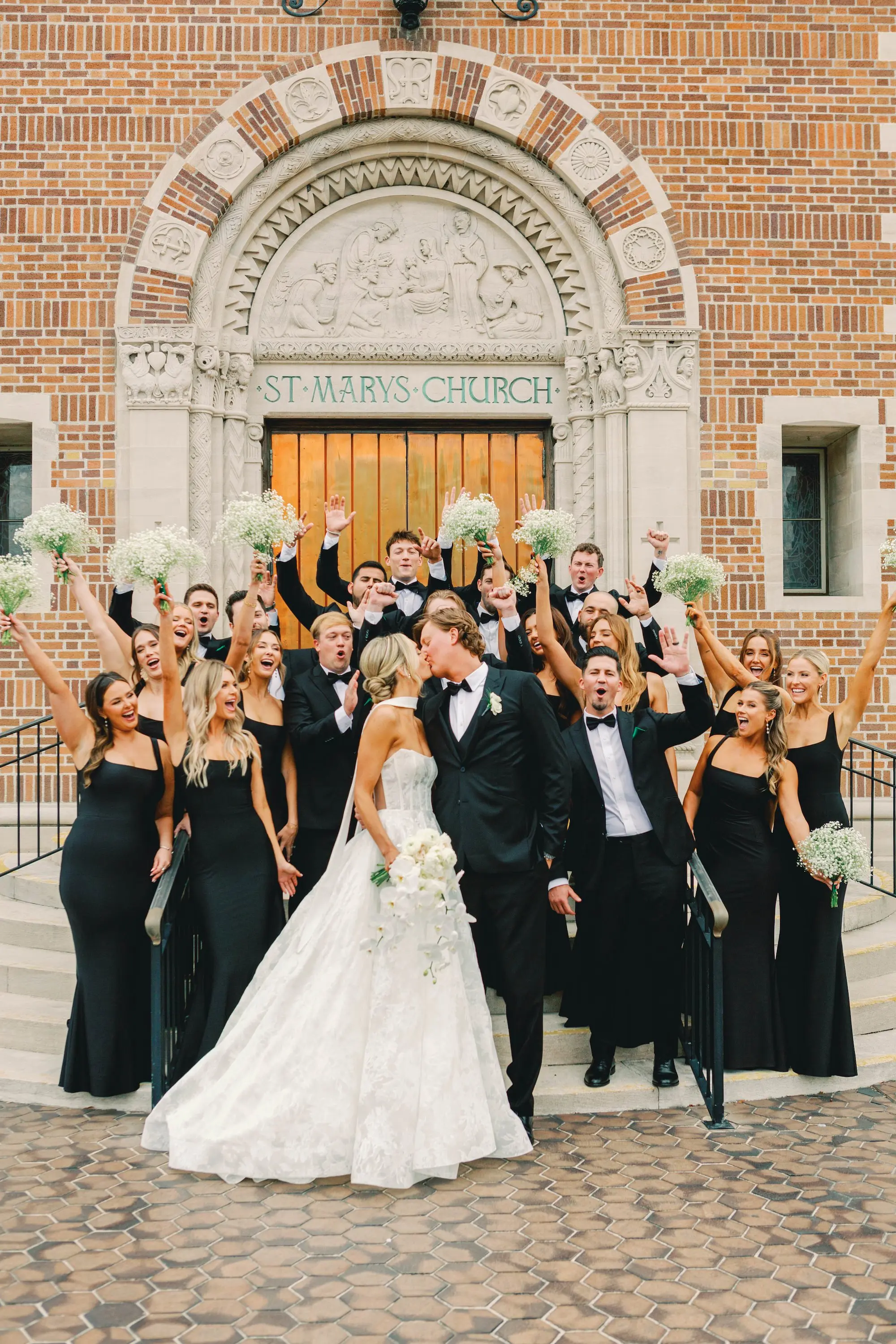21Classic White and Green Wedding Ideas St. Mary Our Lady of Grace Church St Pete - Classic, White and Green St. Pete Wedding | The James Museum of Western & Wildlife Art Bride and Groom with Bridal Party Church Steps Kiss Wedding Portrait | White Baby's Breath Bouquet Ideas | Wedding Ceremony Venue St. Mary Our Lady of Grace Catholic Church