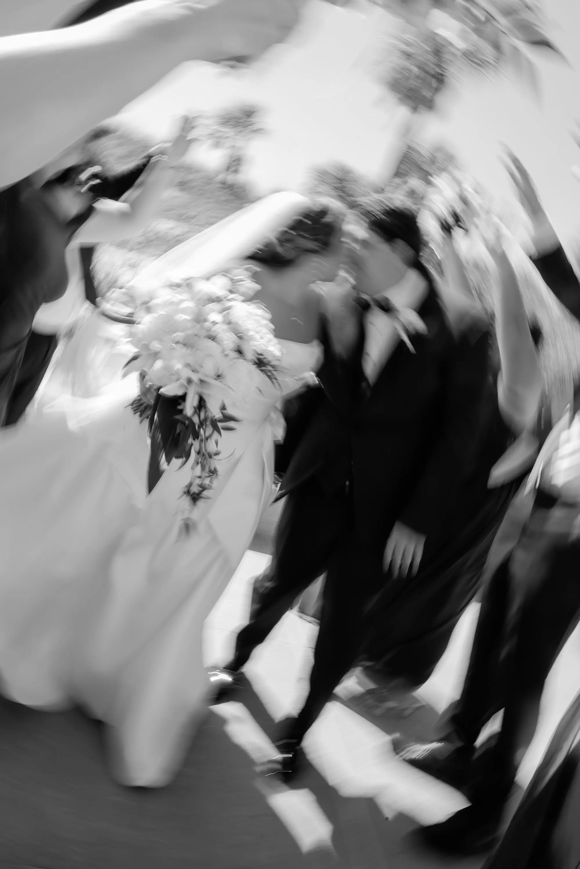 Blurry Black and White Bride and Groom Just Married Wedding Ceremony Portrait | Bride and Bridesmaid Outdoor Beach Wedding Portrait | Mismatched Styles Dark Green Azazie Bridesmaid Dresses Inspiration | White Florals with Greenery Bridal Bouquets Ideas | Tampa Bay Florist Save The Date Florida | St Pete Photographer Lifelong Photography Studio