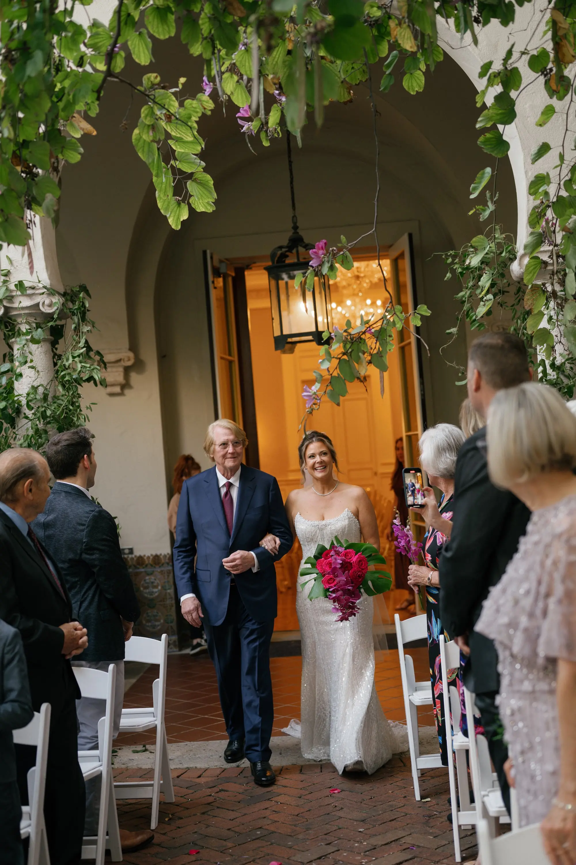 Bride and Father Walking Down Wedding Aisle
