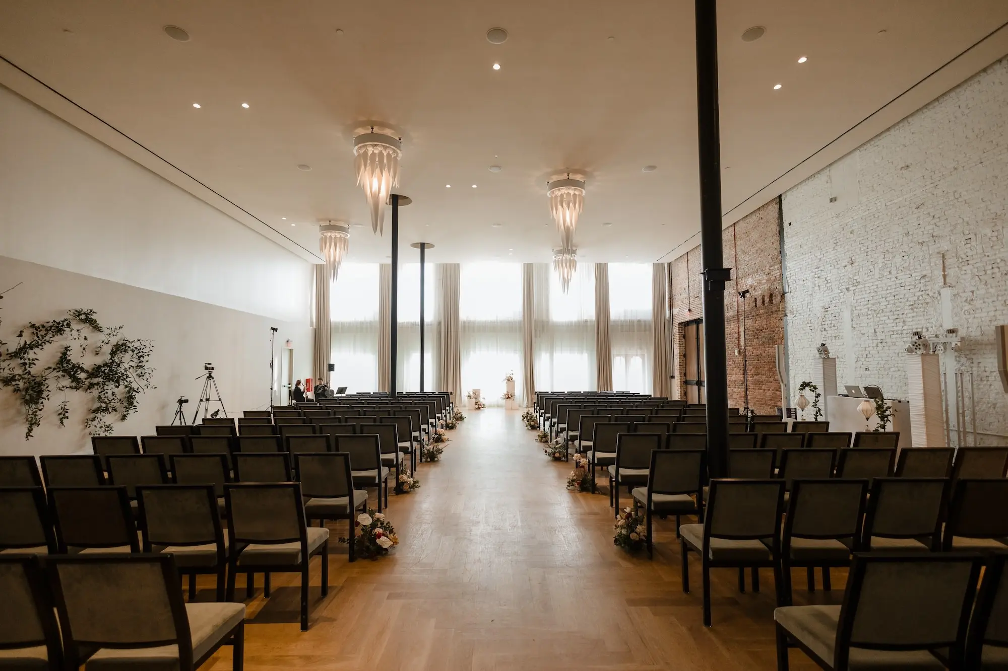 27Modern Romantic Wedding Inspiration Tampa Venue Hotel Haya - Modern, Moody Fall Ybor City Wedding | Hotel Haya Romantic Hotel Wedding Ceremony Venue Ideas | Green and Black Linear Ceremony Chairs Inspiration | Tampa Bay Photographer Evoke Photo and Film | Venue Hotel Haya | Tampa Bay Event Planner Wilder Minds Events