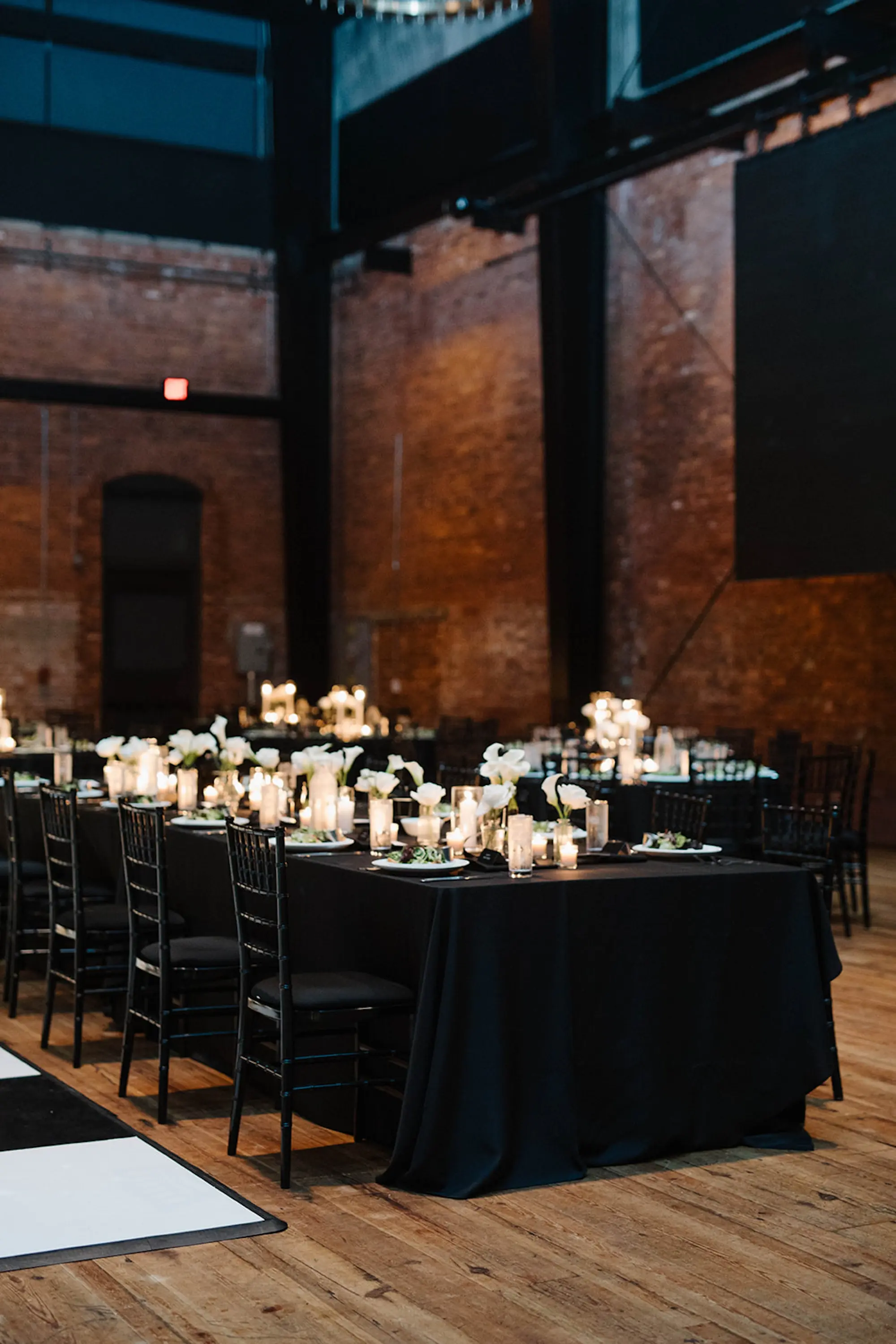 Moody Modern Monochromatic Black Tie Romantic Candlelit Indoor Wedding Reception Inspiration | St Pete Event Planner Coastal Coordinating | Downtown Tampa Heights Event Venue Armature Works