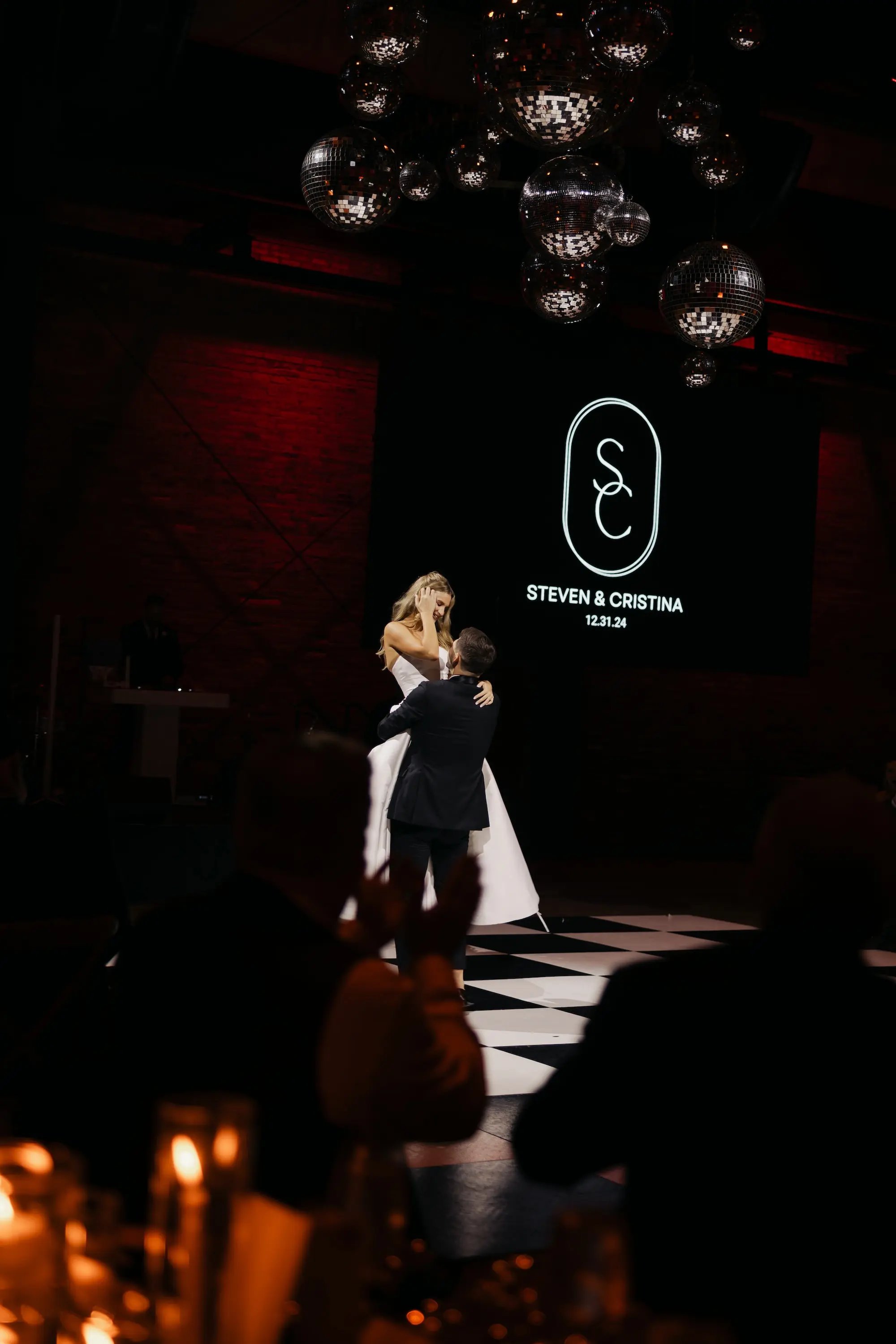 Bride and Groom First Dance Wedding Portrait | Black and White Checkered Dance Floor Ideas | Downtown Tampa Heights Event Venue Armature Works