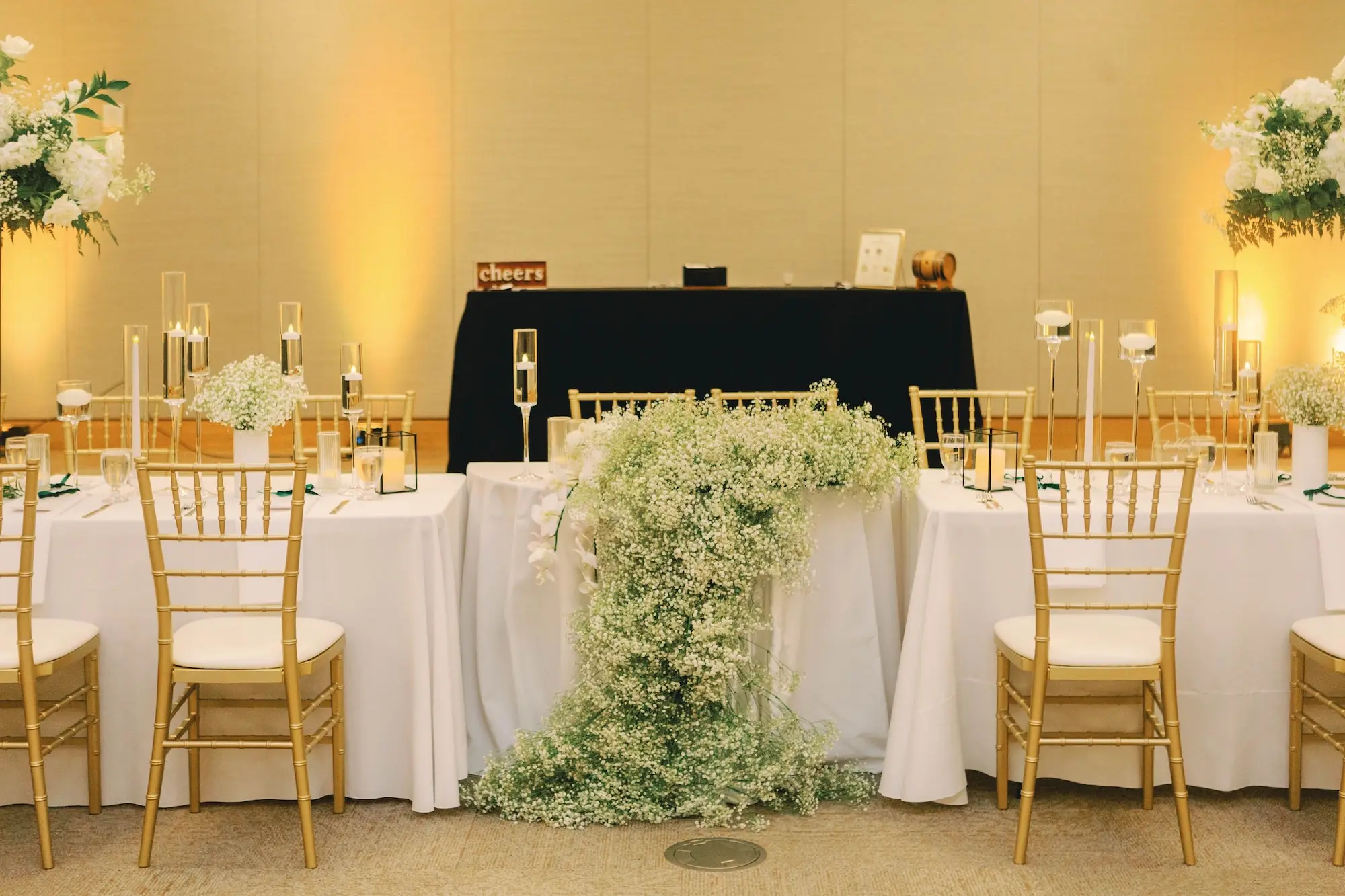 31Classic White and Green Wedding Ideas - Classic, White and Green St. Pete Wedding | The James Museum of Western & Wildlife Art Timeless Black and White Museum Ballroom Wedding Reception | Gold Chiavari Chairs | Tall Floating Tea Candles Table Decor Ideas | Cascading White Baby's Breath Garland Floral Decor Inspiration | St. Pete Wedding Venue The James Museum | Kate Ryan Event Rentals