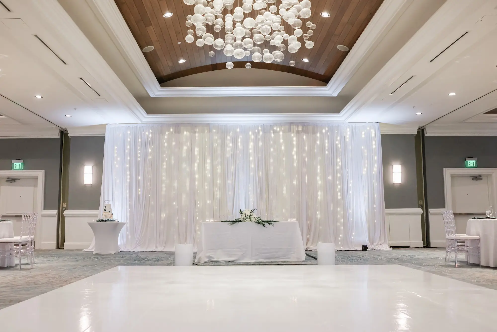 Elegant, Fresh White Ballroom Wedding Reception Dance Floor Inspiration | White Wall Linens with String Lights Backdrop Ideas | Tampa Bay DJ Grant Hemond and Associates | Florida Planner Special Moments Event Planning | Wedding Venue Hyatt Regency Clearwater Beach