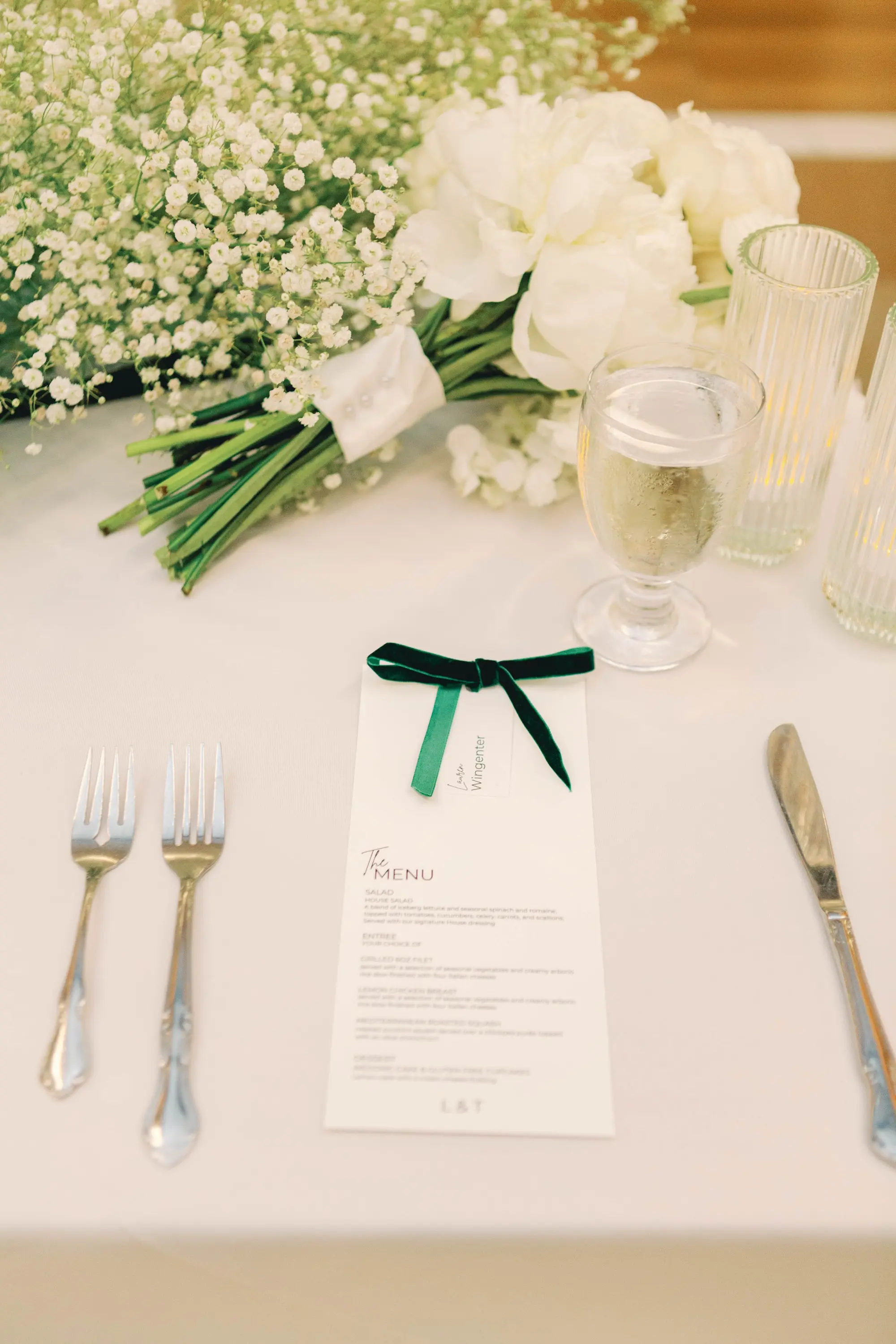 34Classic White and Green Wedding Ideas - Classic, White and Green St. Pete Wedding | The James Museum of Western & Wildlife Art Timeless Black and White Museum Ballroom Wedding Reception | White Baby's Breath Floral Decor Inspiration | White Menu Card with Dark Christmas Green Velvet Bow Ideas | Kate Ryan Event Rentals
