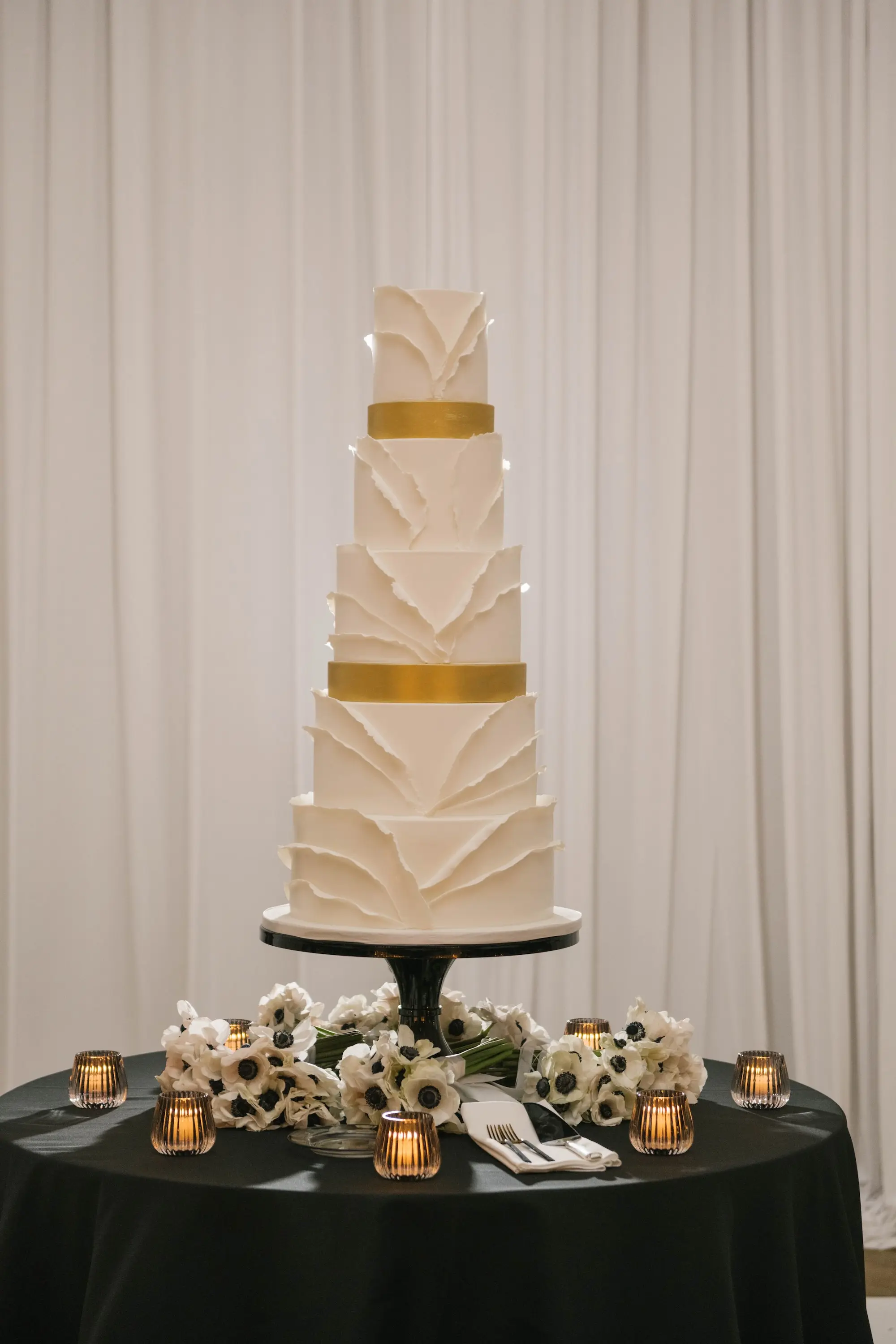 Romantic White Five-Tiered White and Gold Wedding Cake Display Inspiration