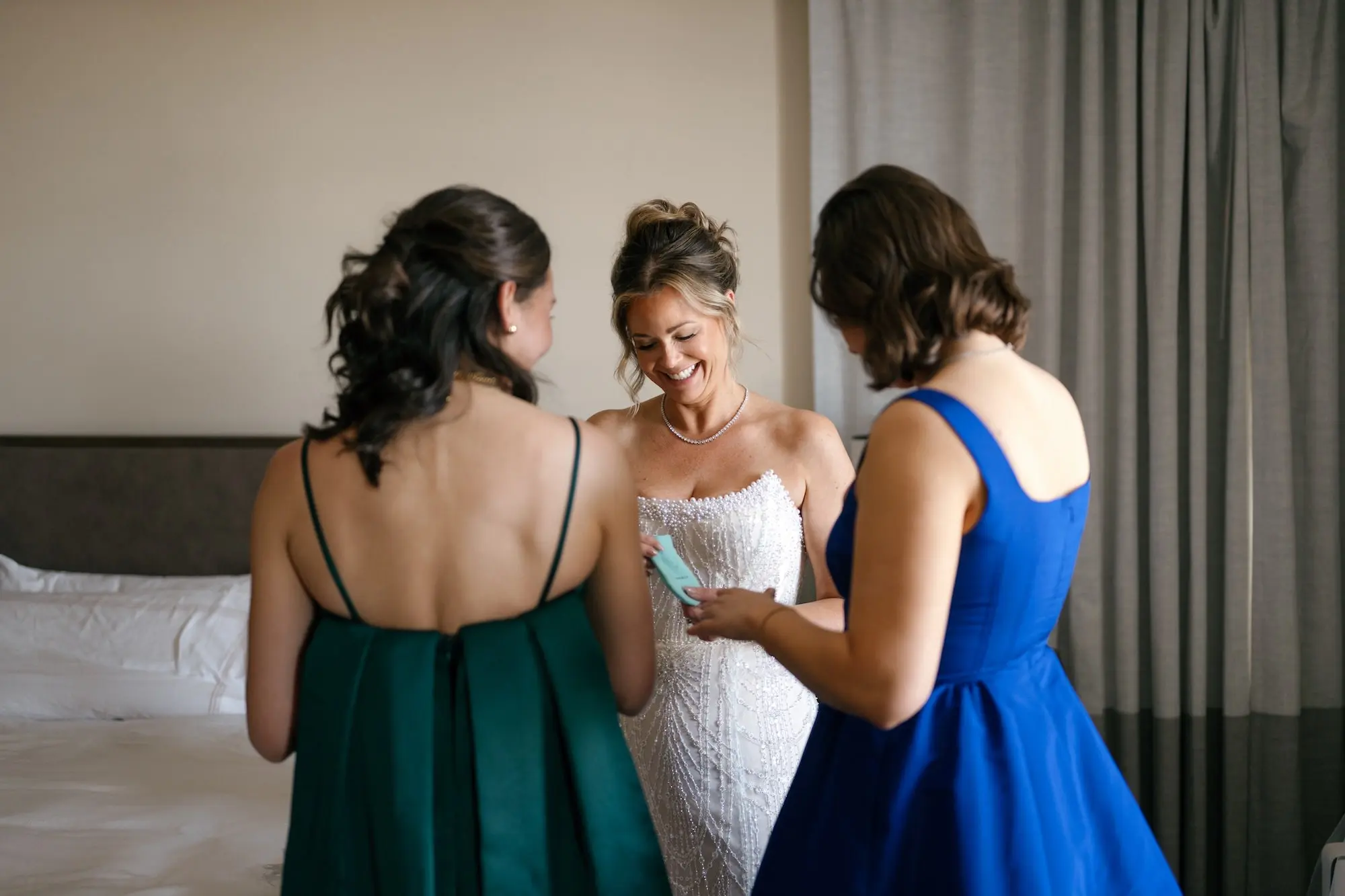 Bride and Bridesmaids Getting Ready Wedding Portrait