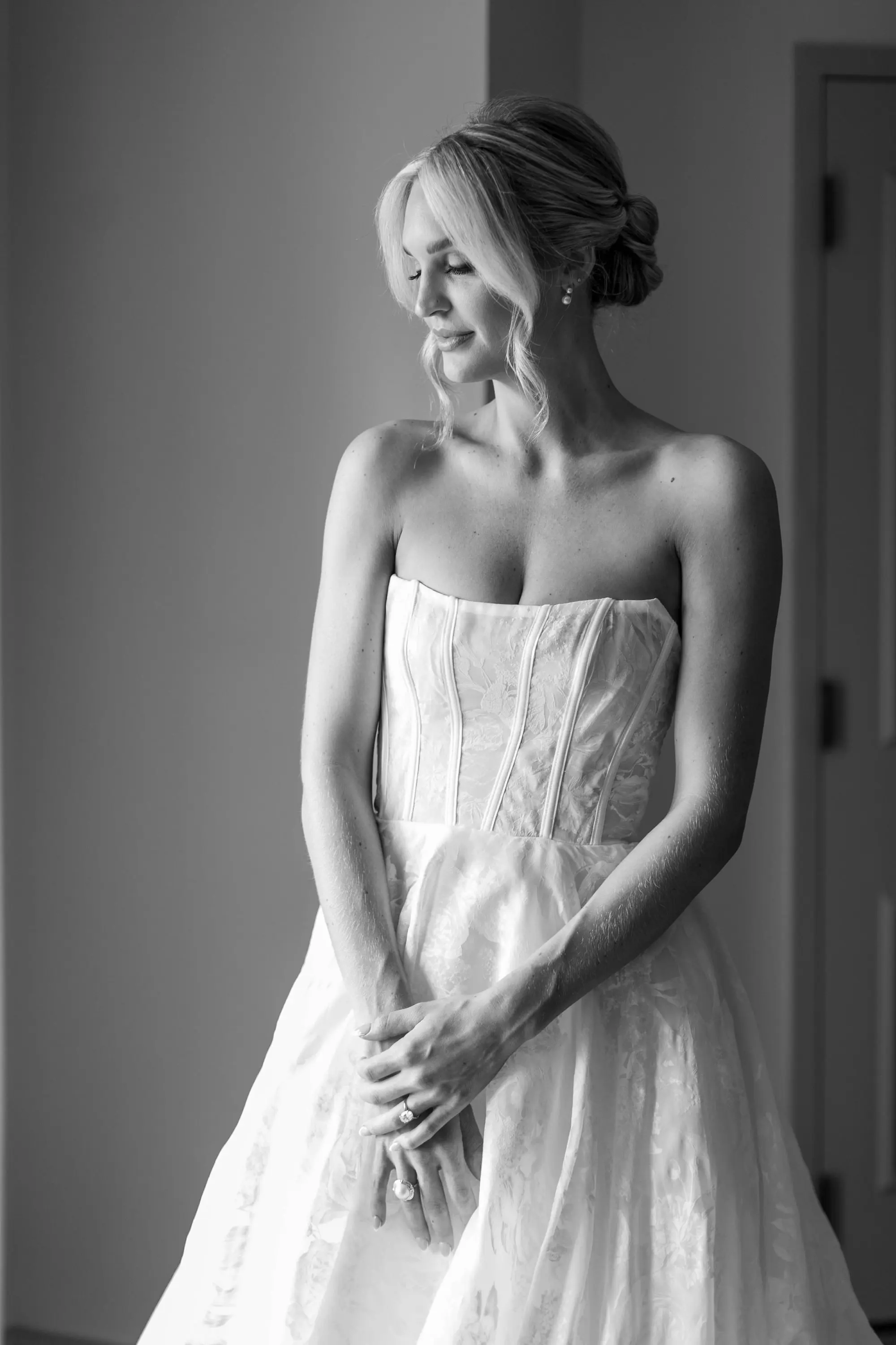 6Classic White and Green Wedding Ideas - Classic, White and Green St. Pete Wedding | The James Museum of Western & Wildlife Art Bride Getting Ready Black and White Wedding Portrait | Strapless Corset Bodice Wedding Gown Inspiration | Low Bun with Loose Front Curls Bridal Hair Ideas