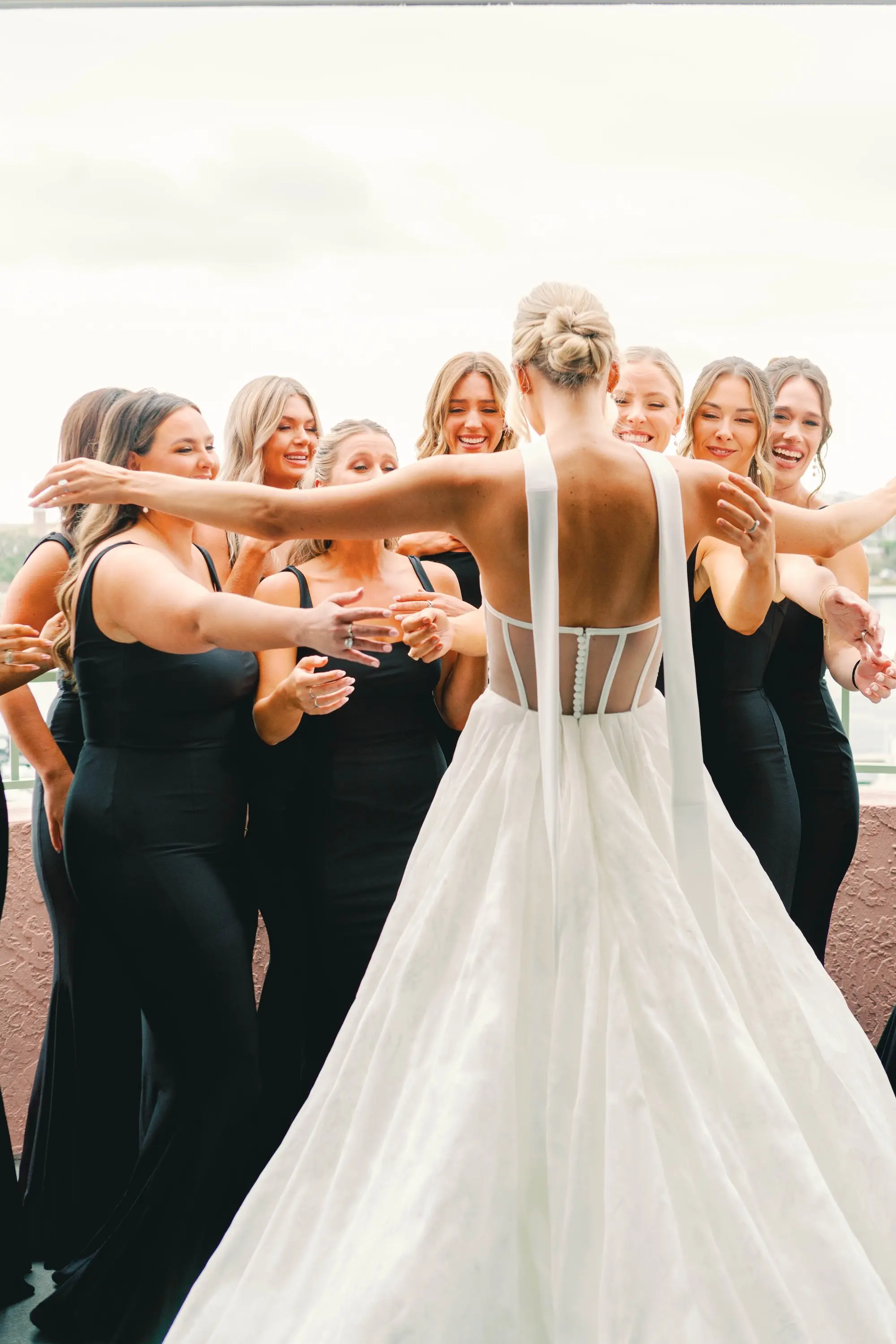 8Classic White and Green Wedding Ideas - Classic, White and Green St. Pete Wedding | The James Museum of Western & Wildlife Art Bride and Bridesmaid First Look Wedding Portrait | Black Square Neckline Bridesmaid Dresses Inspiration | White Wedding Gown with Ballgown Skirt and Fitted Strapless Bodice with . Appliqué Details Ideas