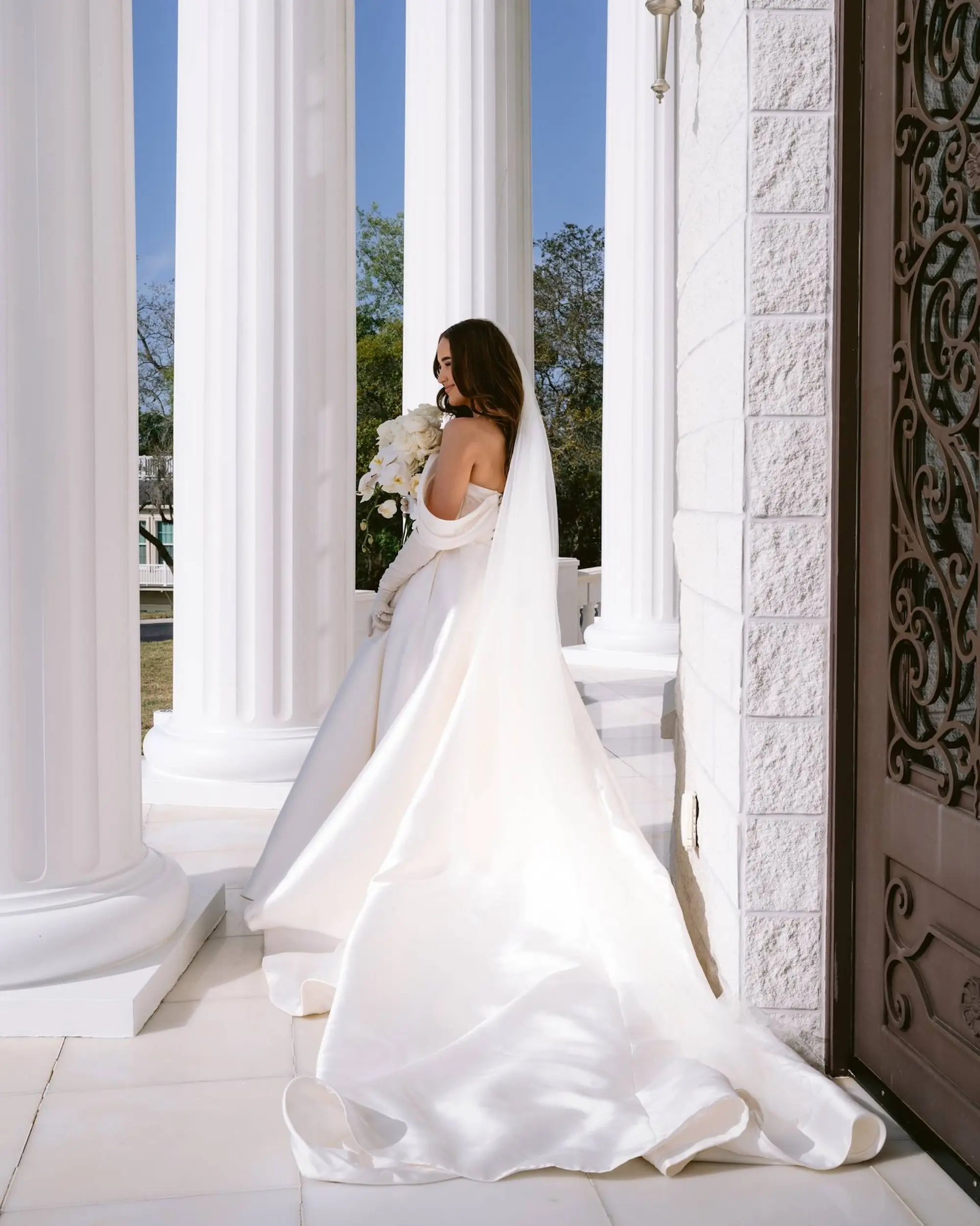 Bride Wedding Portrait | Romantic Off the Shoulder White Ball Gown Milla Nova Wedding Dress Inspiration | Cathedral Length Traditional Chiffon Veil Ideas | Monochromatic White Bridal Bouquet Inspiration | Tampa Bay Event Venue Whitehurst Gallery