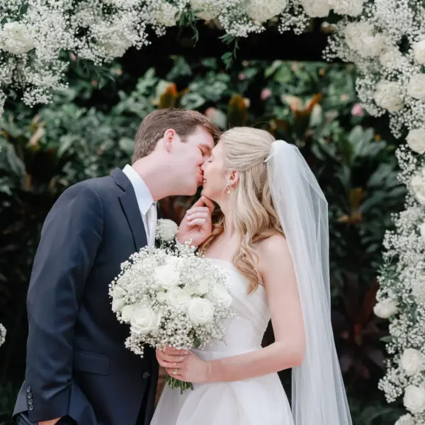 14Elegant Timeless Ivory and Green Garden Wedding - Romantic Outdoor St. Pete Wedding | Sunken Gardens Bride and Groom Wedding Ceremony Portrait | White Roses and Baby's Breath Floral Arch Altar Decor Inspiration | Timeless White Roses Bridal Bouquet Ideas | Traditional Chiffon Veil in Half Up Half Down Soft Curls Bridal Hair Inspiration | St Pete Photographer Lifelong Photography Studio | Sarasota Hair and Makeup Artist Femme Akoi Beauty Studio