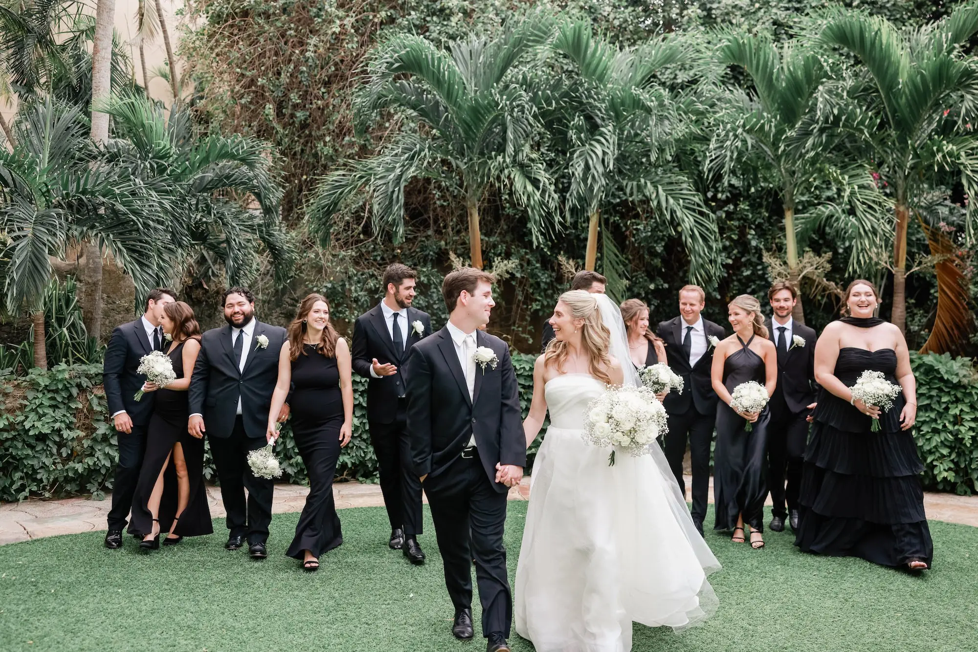 15Elegant Timeless Ivory and Green Garden Wedding - Romantic Outdoor St. Pete Wedding | Sunken Gardens Bride and Groom with Bridal Party Wedding Portrait | Mismatched Style Black Bridesmaid Dresses Inspiration | Classic White Roses and Baby's Breath Bouquet Ideas | St Pete Photographer Lifelong Photography Studio | Venue Sunken Gardens Wedding Portrait