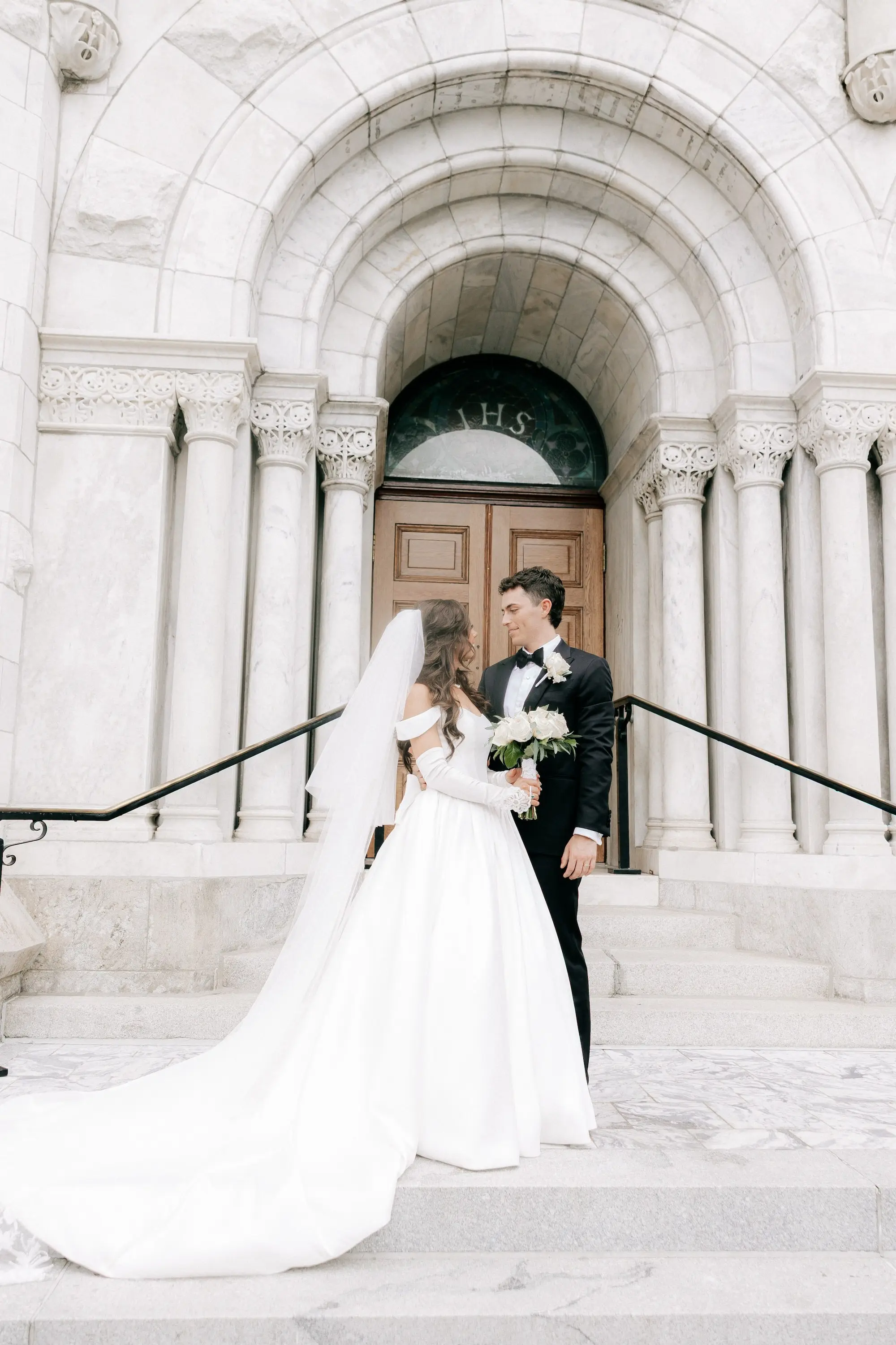 18Classic Gold and White Wedding Decor Inspiration Tampa Venue Sacred Heart Catholic Church - Classic, Ivory Rooftop Wedding | Grand Hyatt Tampa Bay Bride and Groom in Front of Sacred Heart Catholic Church Wedding Ceremony Venue Wedding Portrait