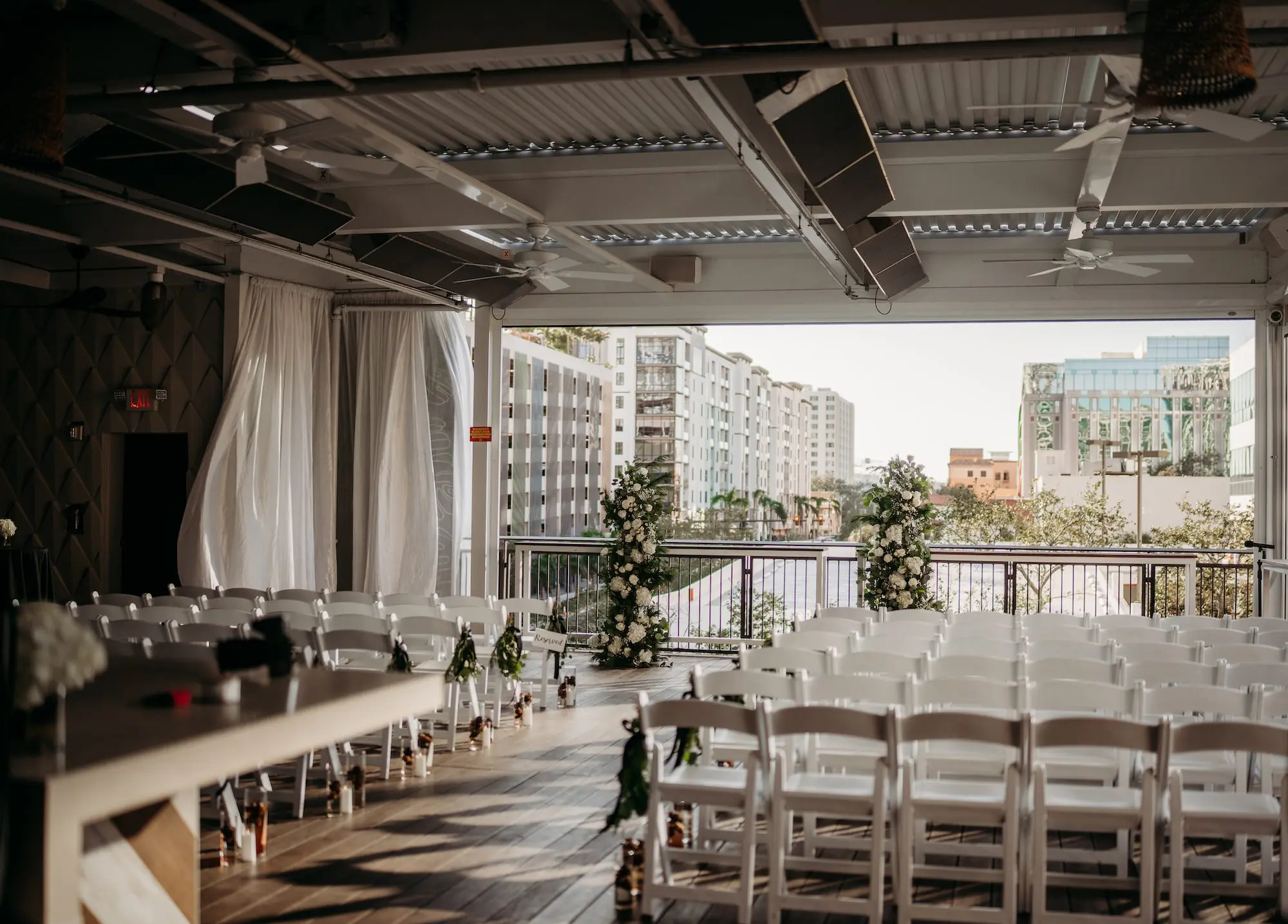 Elegant Black and White Winter Wedding Ceremony Decor Ideas | St Pete Venue Red Mesa Events
