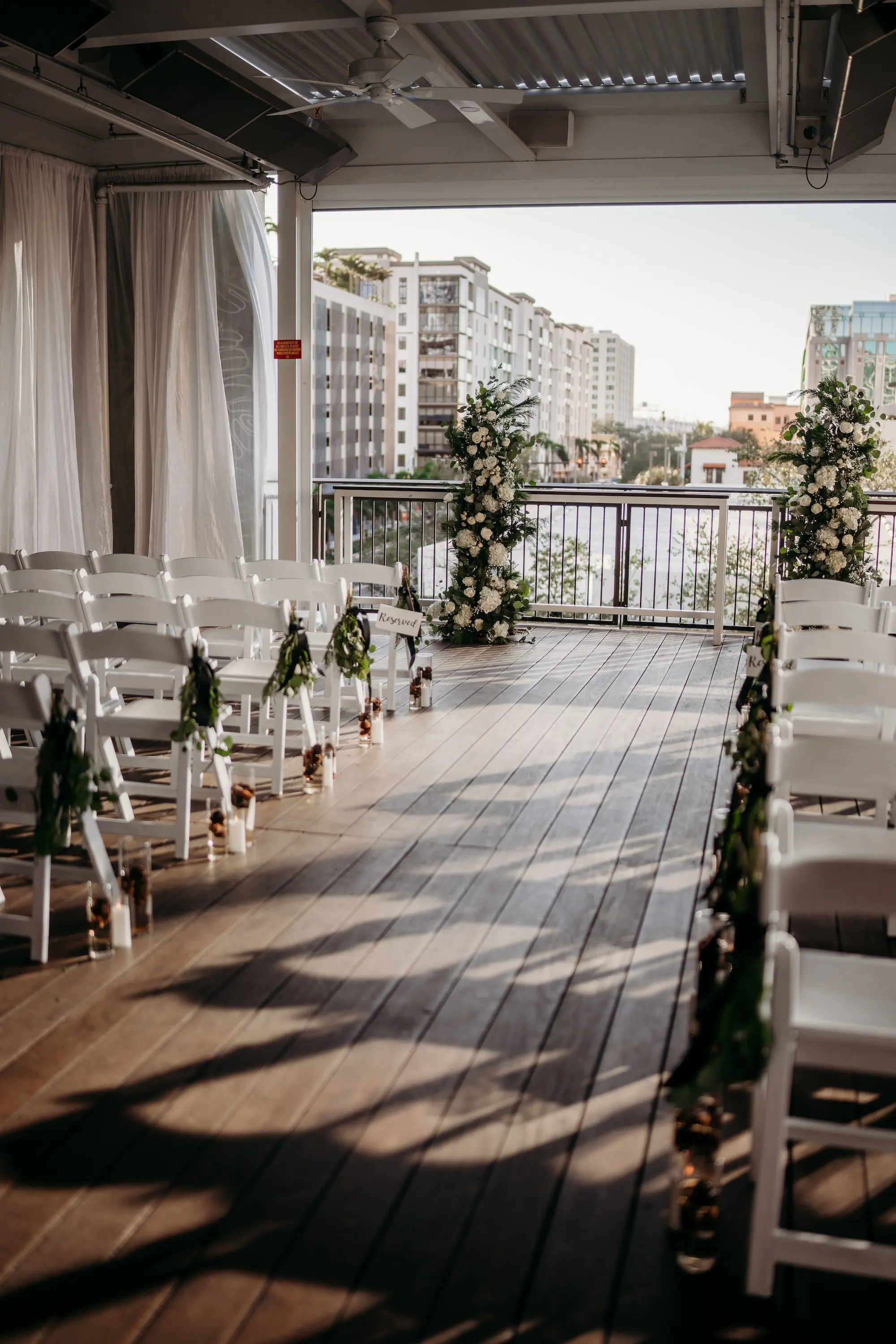 Elegant Black and White Winter Wedding Ceremony Decor Ideas | St Pete Venue Red Mesa Events