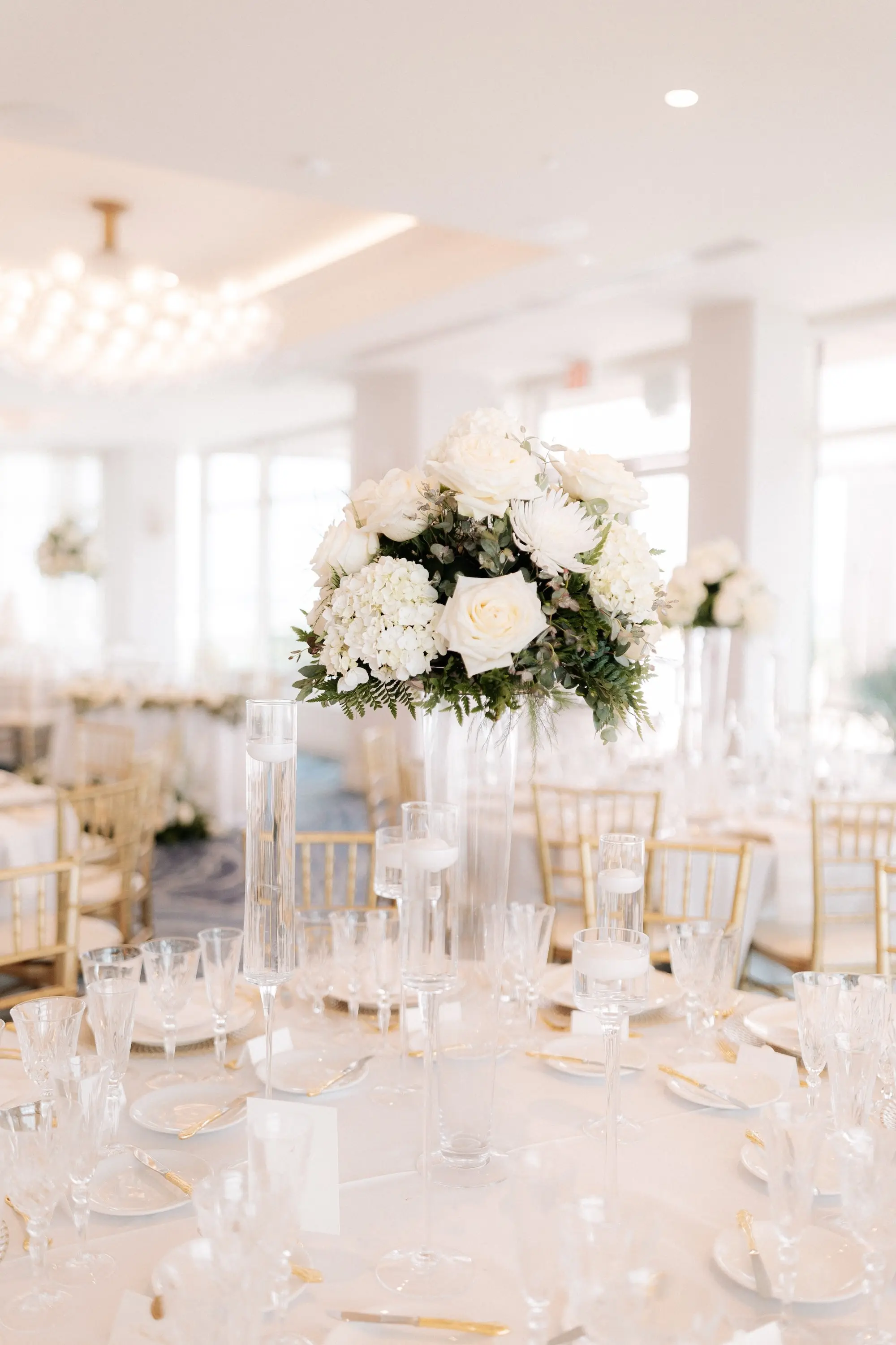 23Classic Gold and White Wedding Decor Inspiration - Classic, Ivory Rooftop Wedding | Grand Hyatt Tampa Bay Monochromatic Elegant Tall White Roses, Hydrangeas and Floral Wedding Reception Centerpiece Decor Inspiration