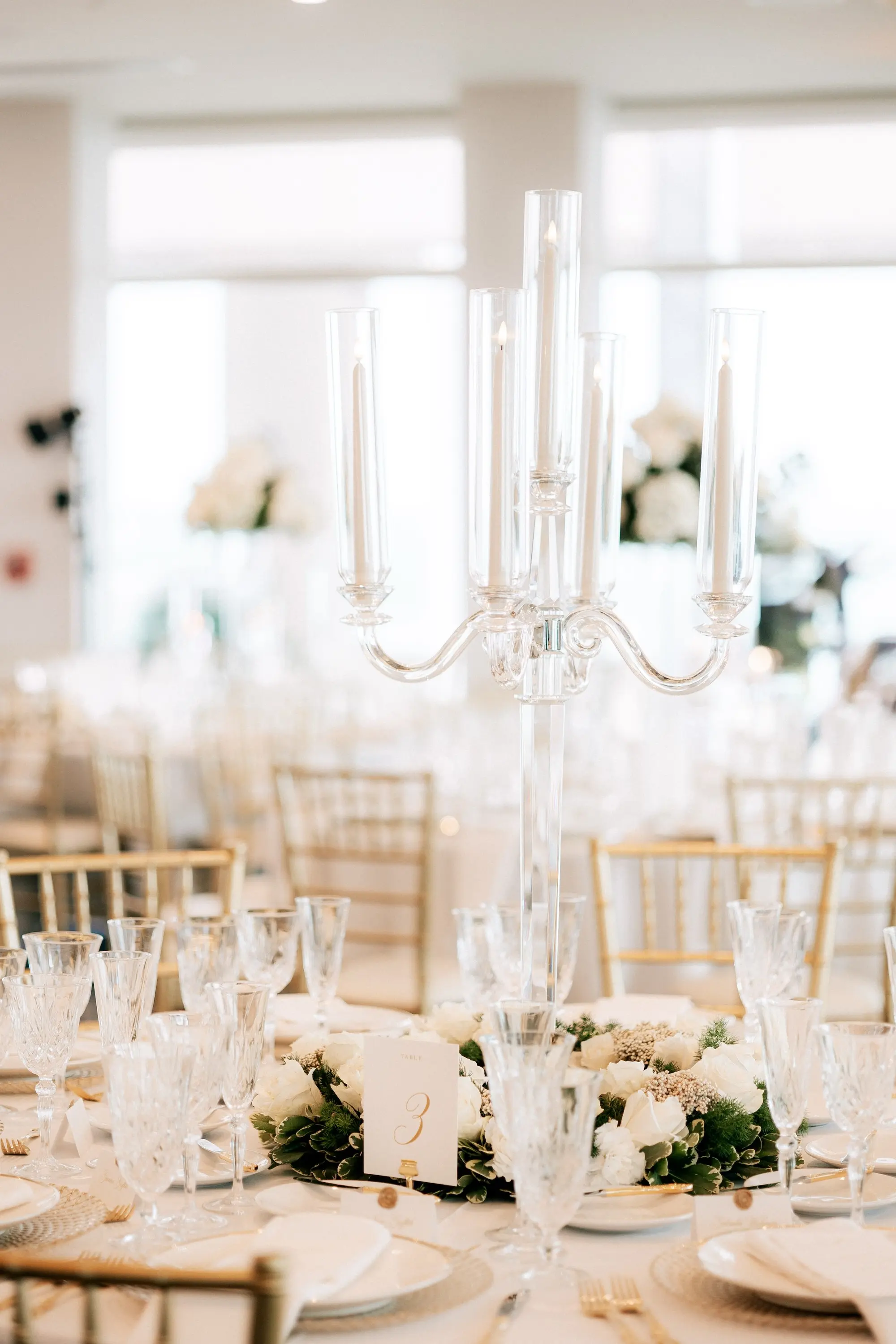 25Classic Gold and White Wedding Decor Inspiration - Classic, Ivory Rooftop Wedding | Grand Hyatt Tampa Bay Crystal Clear Taper Candle Candelabra Wedding Reception Decor Inspiration | Gold Flatware with Crystals Glassware Ideas | Tampa Bay Kate Ryan Event Rentals