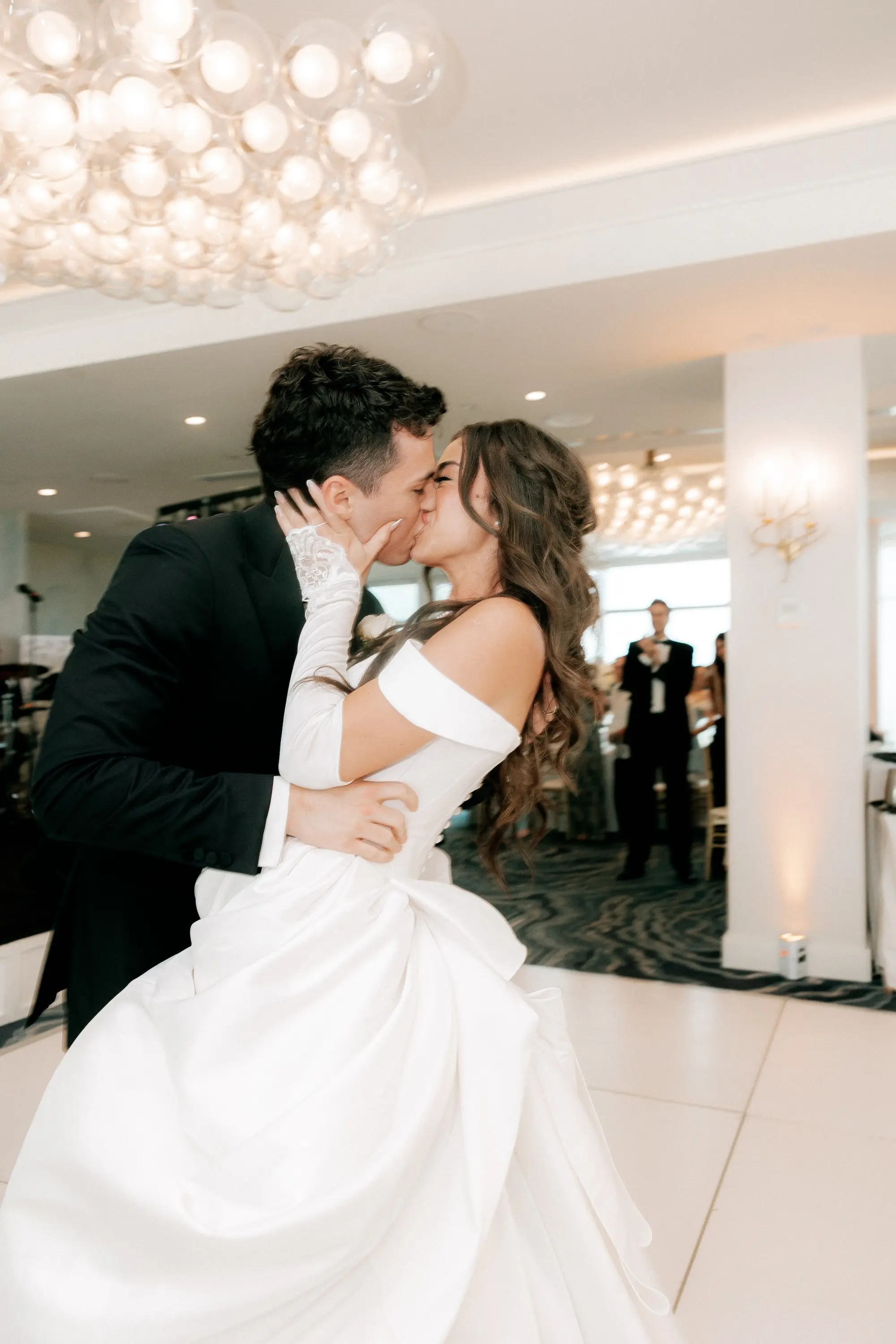 30Classic Gold and White Wedding Decor Inspiration - Classic, Ivory Rooftop Wedding | Grand Hyatt Tampa Bay Bride and Groom Kissing on the Dance Floor Wedding Reception Portrait