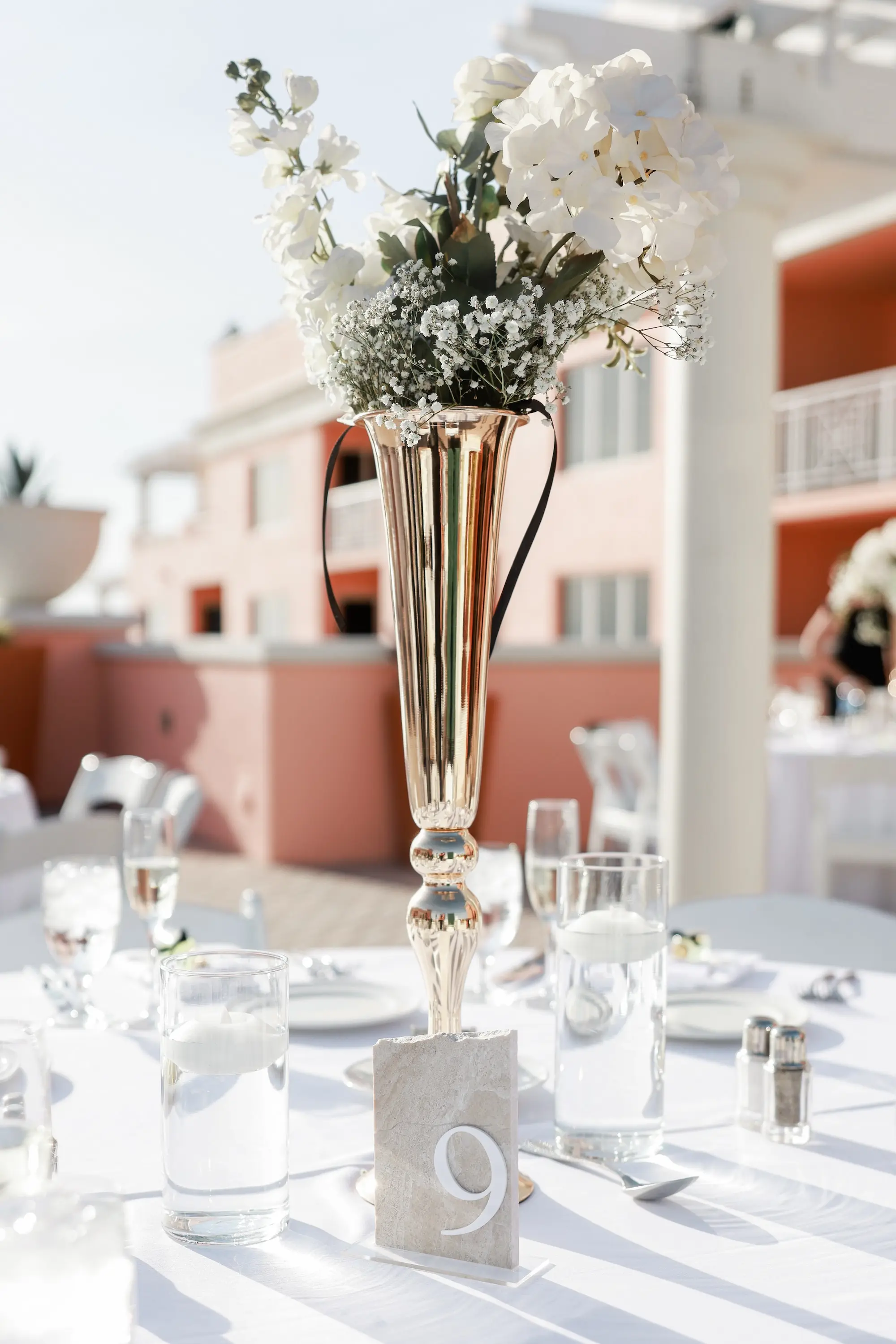 Gold Trumpet Vase with White Florals, Baby's Breath and Greenery Wedding Reception Centerpiece Inspiration | Slate Rock Wedding Reception Table Number Ideas