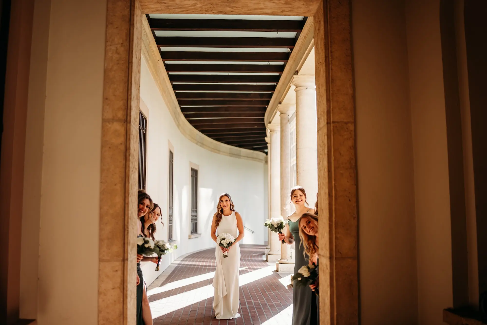 Bride with Bridesmaids Wedding Portrait | Tampa Bay Event Venue Musuem of Fine Arts