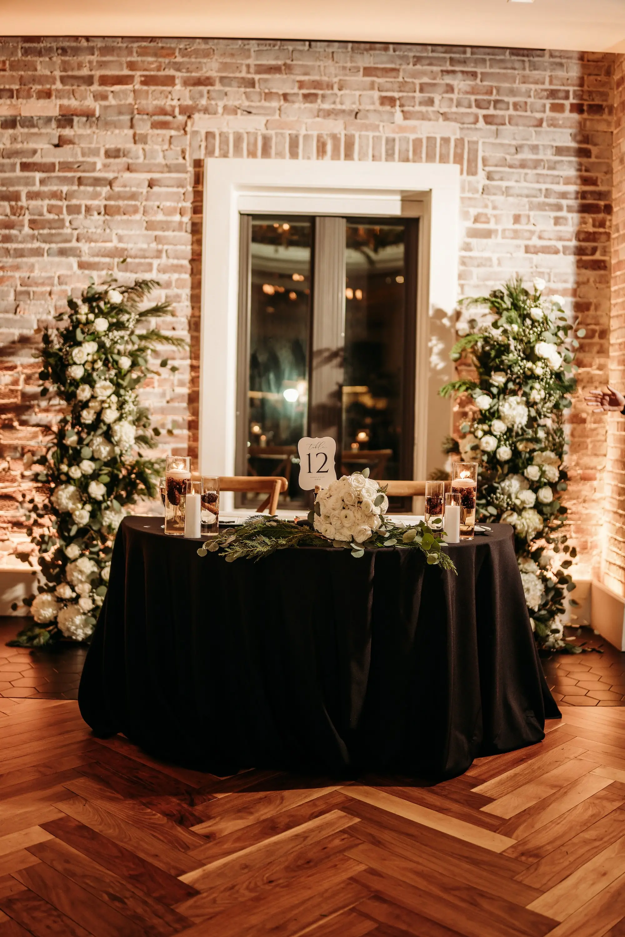 Elegant Black and White Winter Wedding Reception Sweetheart Table Decor Inspiration