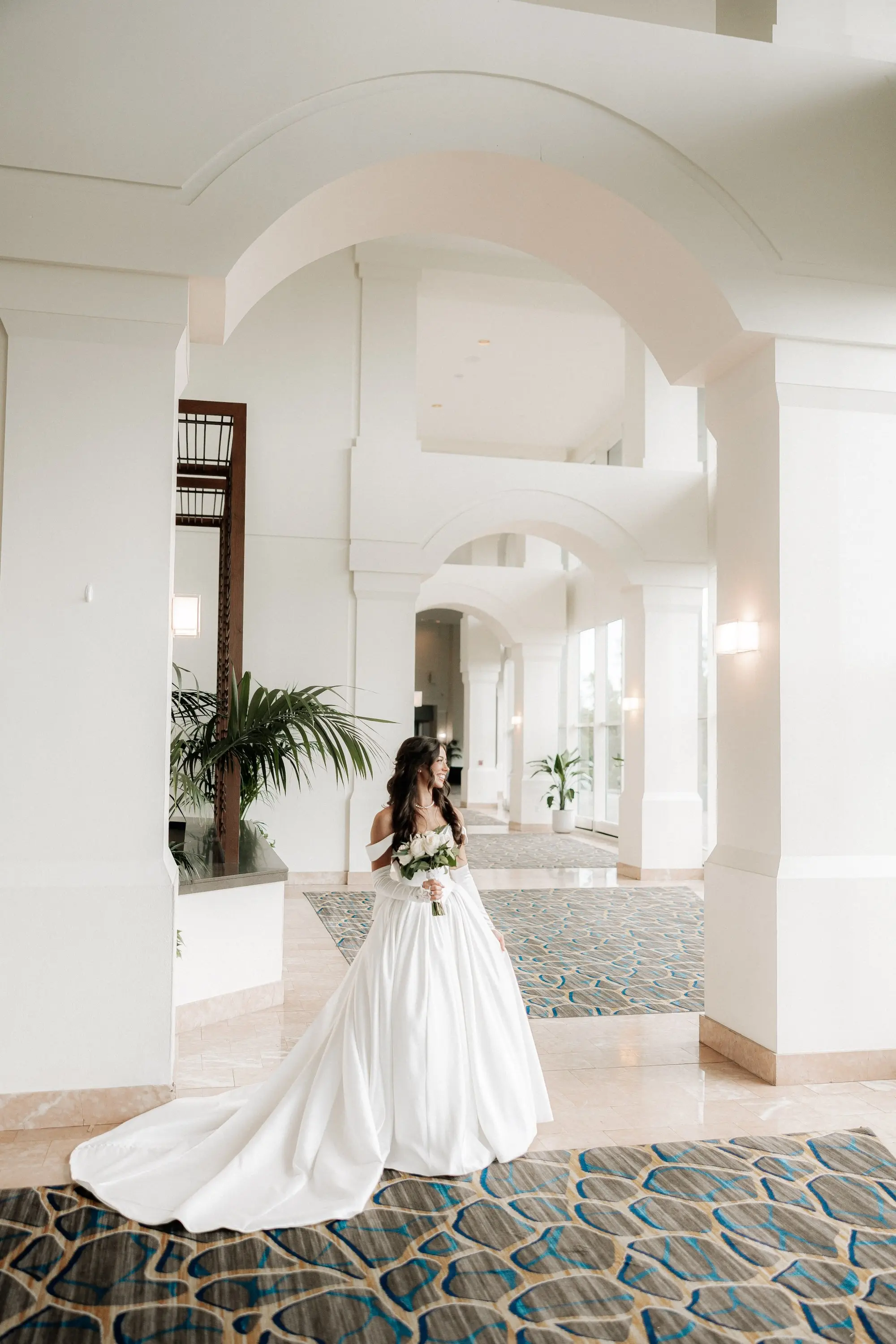 6Classic Gold and White Wedding Decor Inspiration Hotel Venue Grand Hyatt Tampa Bay - Classic, Ivory Rooftop Wedding | Grand Hyatt Tampa Bay Bride Wedding Portrait | White Off-the-Shoulder Ballgown Essense of Australia Wedding Gown with Fitted Bodice Scoop Neck and Long Train Inspiration | Classic White Rose Bridal Bouquet Inspiration