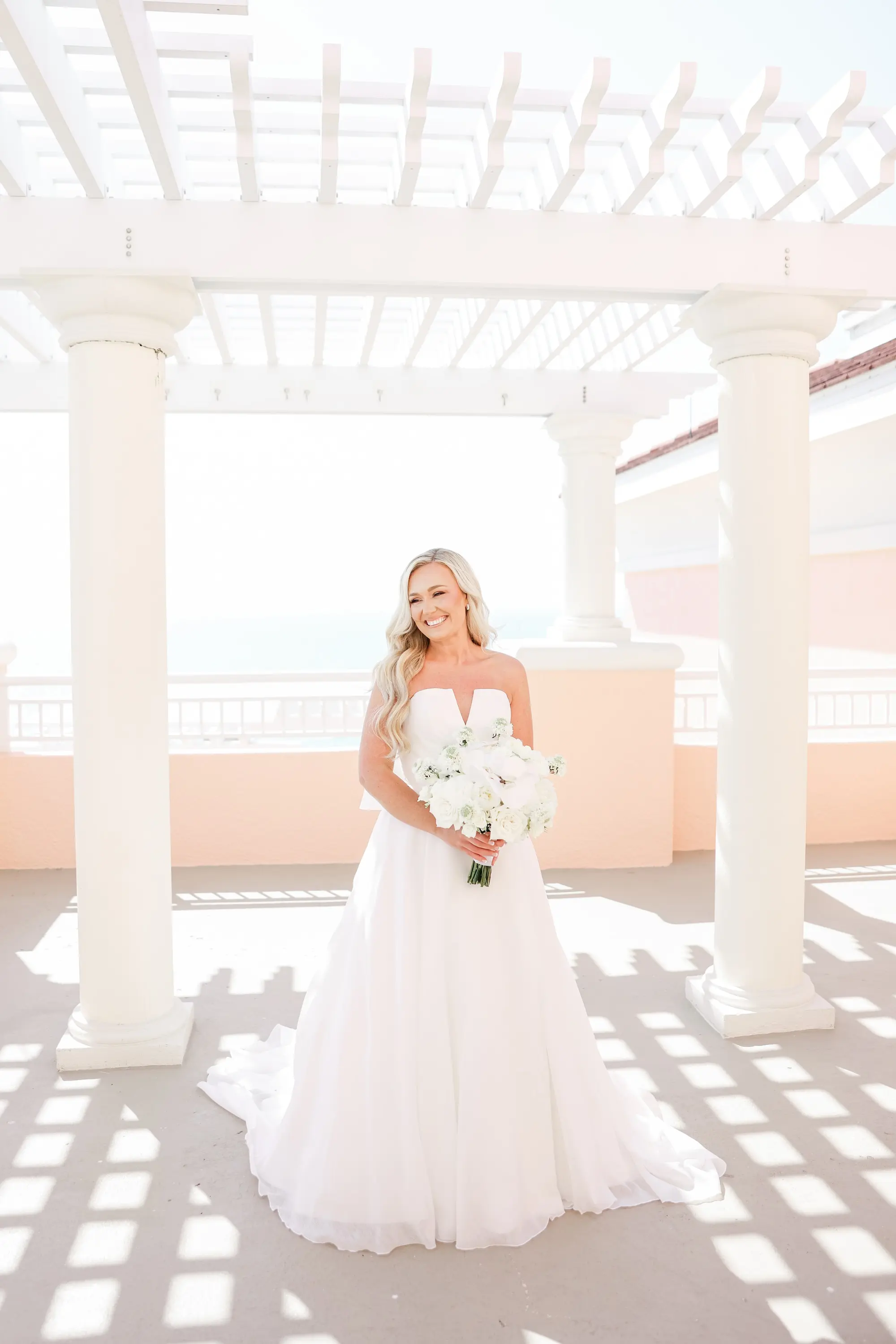 10Classic White Florida Wedding Ideas - Classic, White Rooftop Wedding | Hyatt Regency Clearwater Beach Bride Balcony Oceanfront Wedding Portrait | Tampa Bay Photographer Lifelong Photography Studio
