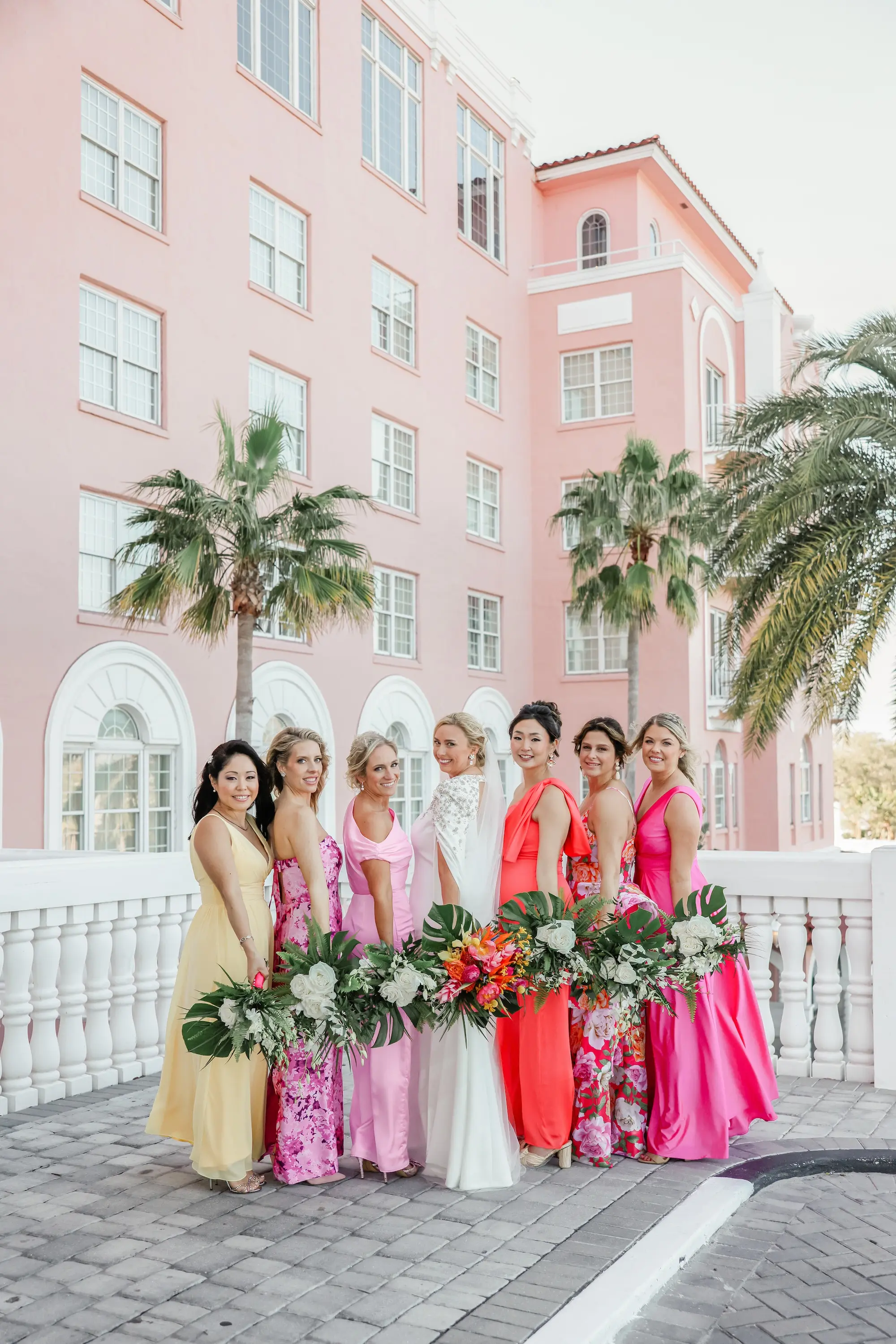 10Luxurious Vibrant Tropical Florida Wedding - Vibrant, Tropical St. Pete Beach Wedding | The Don CeSar Tropical Mismatched Bridesmaids Wedding Dress Ideas
