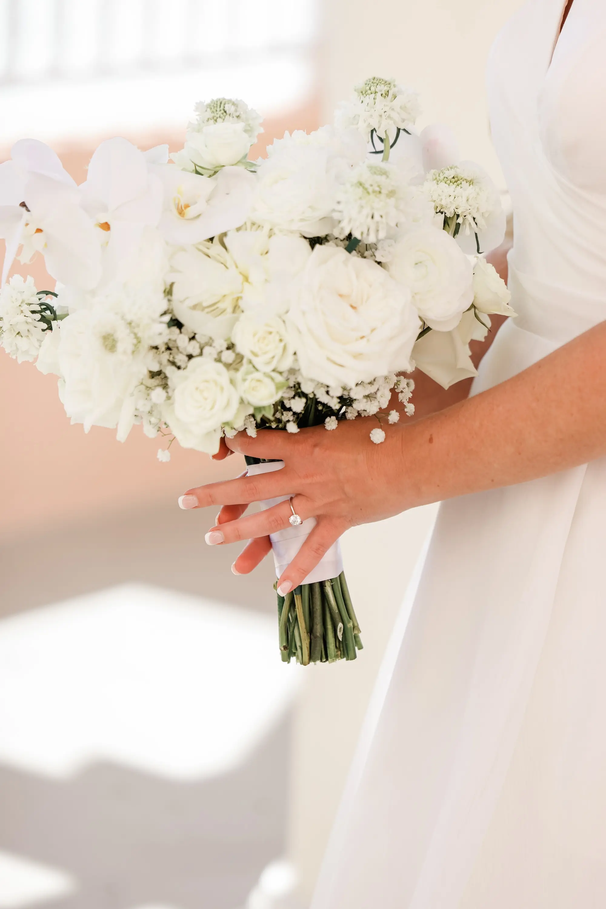 11Classic White Florida Wedding Ideas - Classic, White Rooftop Wedding | Hyatt Regency Clearwater Beach Monochromatic White Roses and Baby's Breath Bridal Bouquet Inspiration | Tampa Bay Photographer Lifelong Photography Studio