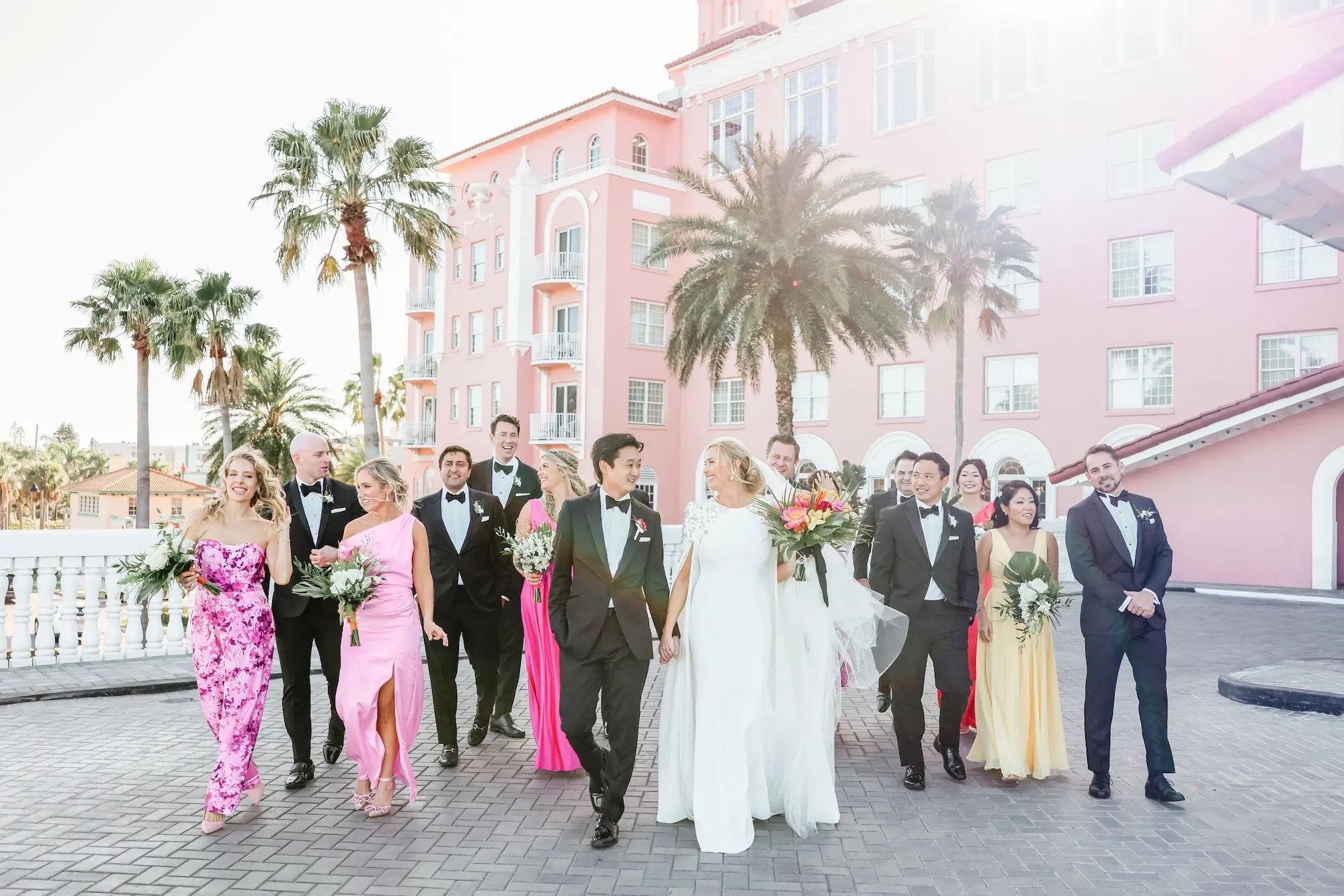 11Luxurious Vibrant Tropical Florida Wedding - Vibrant, Tropical St. Pete Beach Wedding | The Don CeSar Bride and Groom with Bridesmaids Wedding Portrait