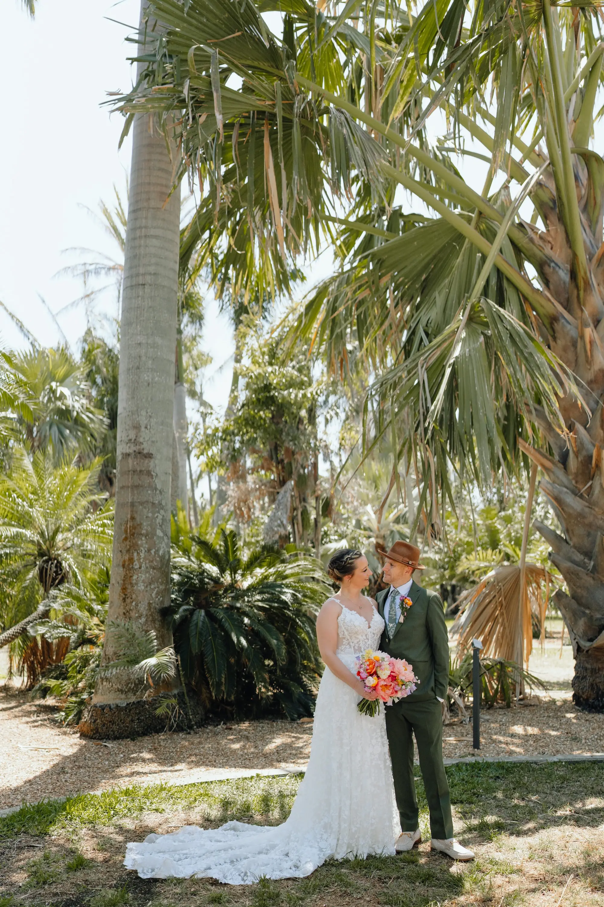13 1Colorful Pink Yellow Orange Florida Wedding Inspiration - Whimsical, Colorful Outdoor Wedding | St. Pete Shuffleboard Club Bride and Groom Wedding Portrait | Tampa Bay Photographer J&S Media | St Pete Content Creator Behind The Vows