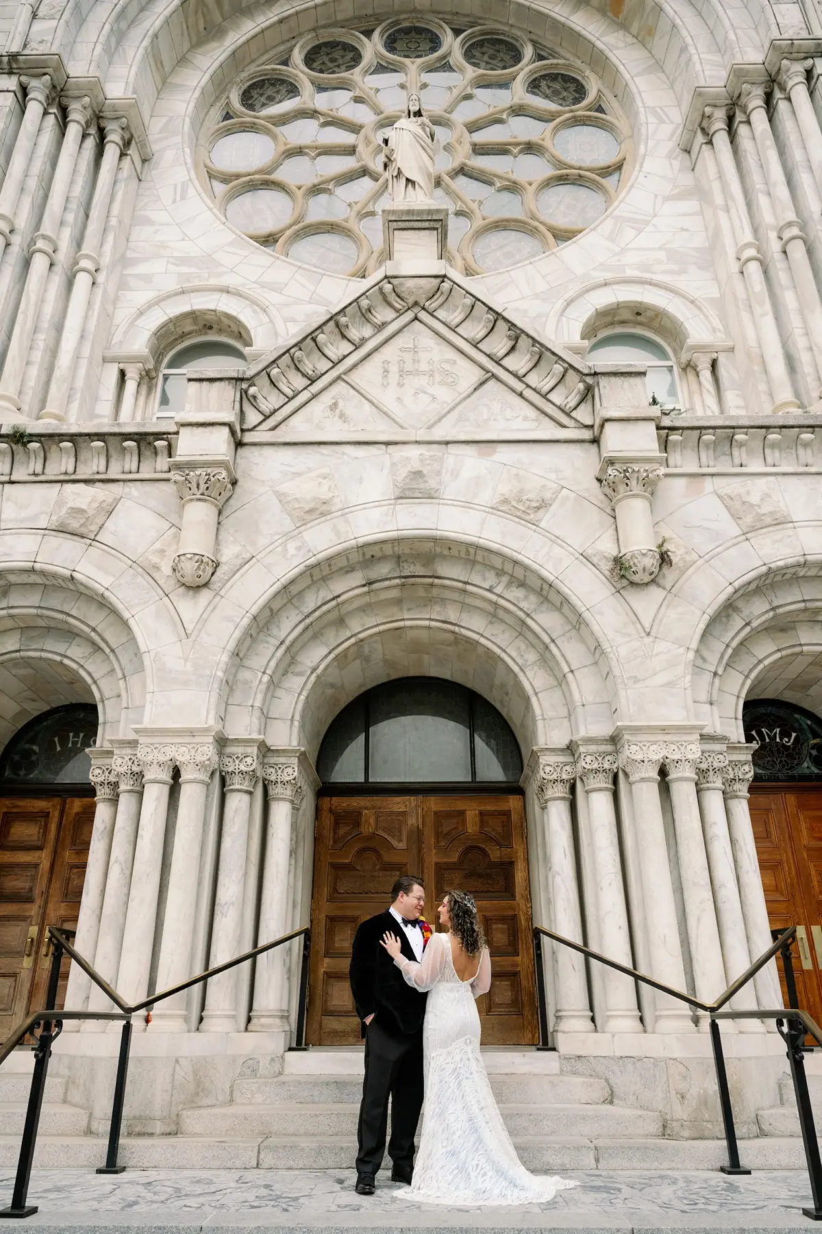 13Whimsical Rainbow Inspired Wedding Ideas Tampa Sacred Heart Catholic Church - Whimsical, Vibrant Downtown Tampa Wedding | Armature Works Bride and Groom in Front of Bride and Downtown Tampa Sacred Heart Catholic Church | Photographer Dewitt For Love Photography