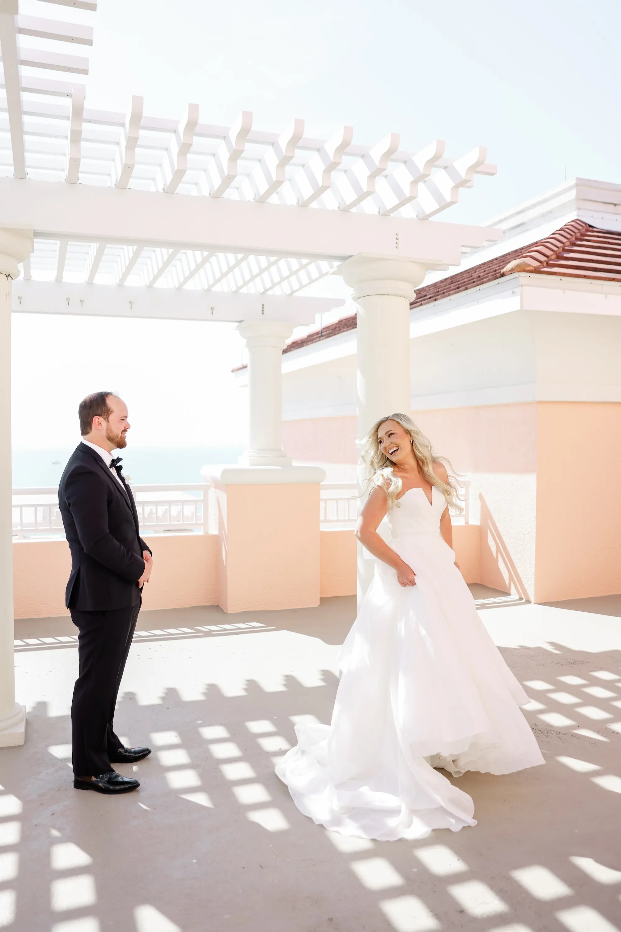14Classic White Florida Wedding Ideas - Classic, White Rooftop Wedding | Hyatt Regency Clearwater Beach Bride and Groom First Look Wedding Portrait | Balcony Oceanview of Venue Hyatt Regency Clearwater Beach Resort and Spa | Tampa Bay Photographer Lifelong Photography Studio