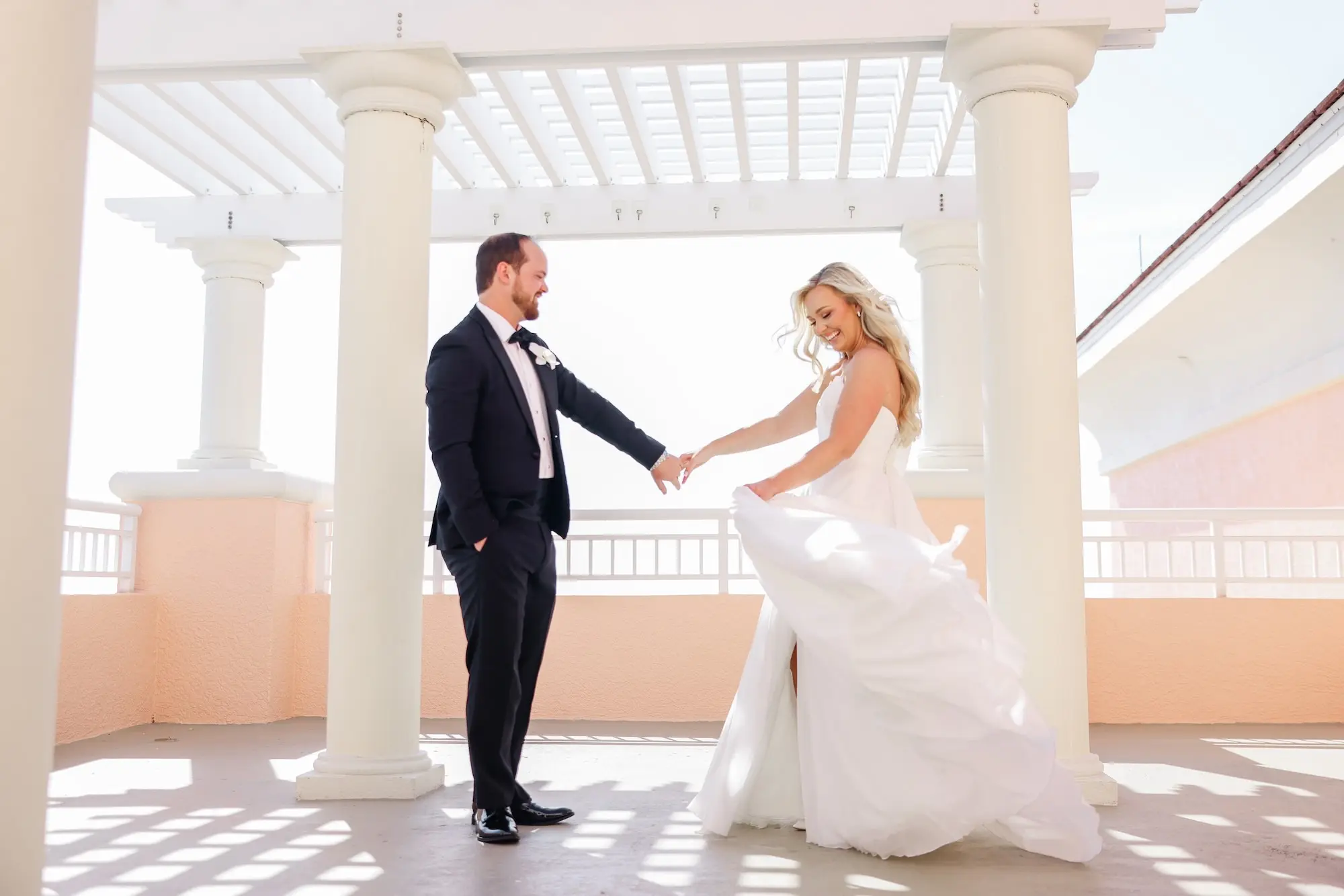 15Classic White Florida Wedding Ideas Venue Hyatt Clearwater Beach - Classic, White Rooftop Wedding | Hyatt Regency Clearwater Beach Bride and Groom First Look Wedding Portrait | Balcony Oceanview of Venue Hyatt Regency Clearwater Beach Resort and Spa | Tampa Bay Photographer Lifelong Photography Studio