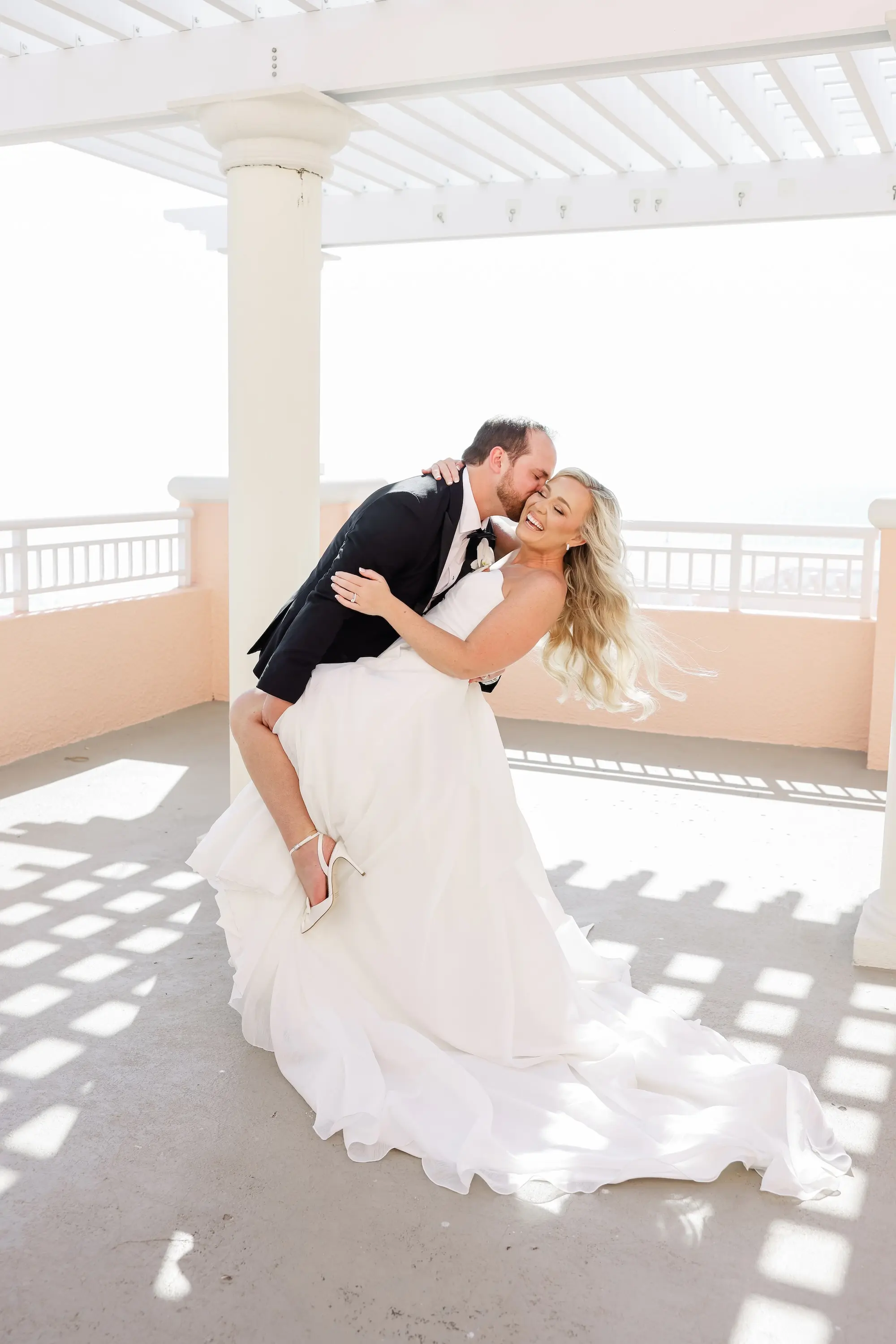16Classic White Florida Wedding Ideas Venue Hyatt Clearwater Beach - Classic, White Rooftop Wedding | Hyatt Regency Clearwater Beach Bride and Groom Waterfront Balcony Wedding Portrait | Tampa Bay Photographer Lifelong Photography Studio | Wedding Venue Hyatt Regency Clearwater Beach Resort and Spa