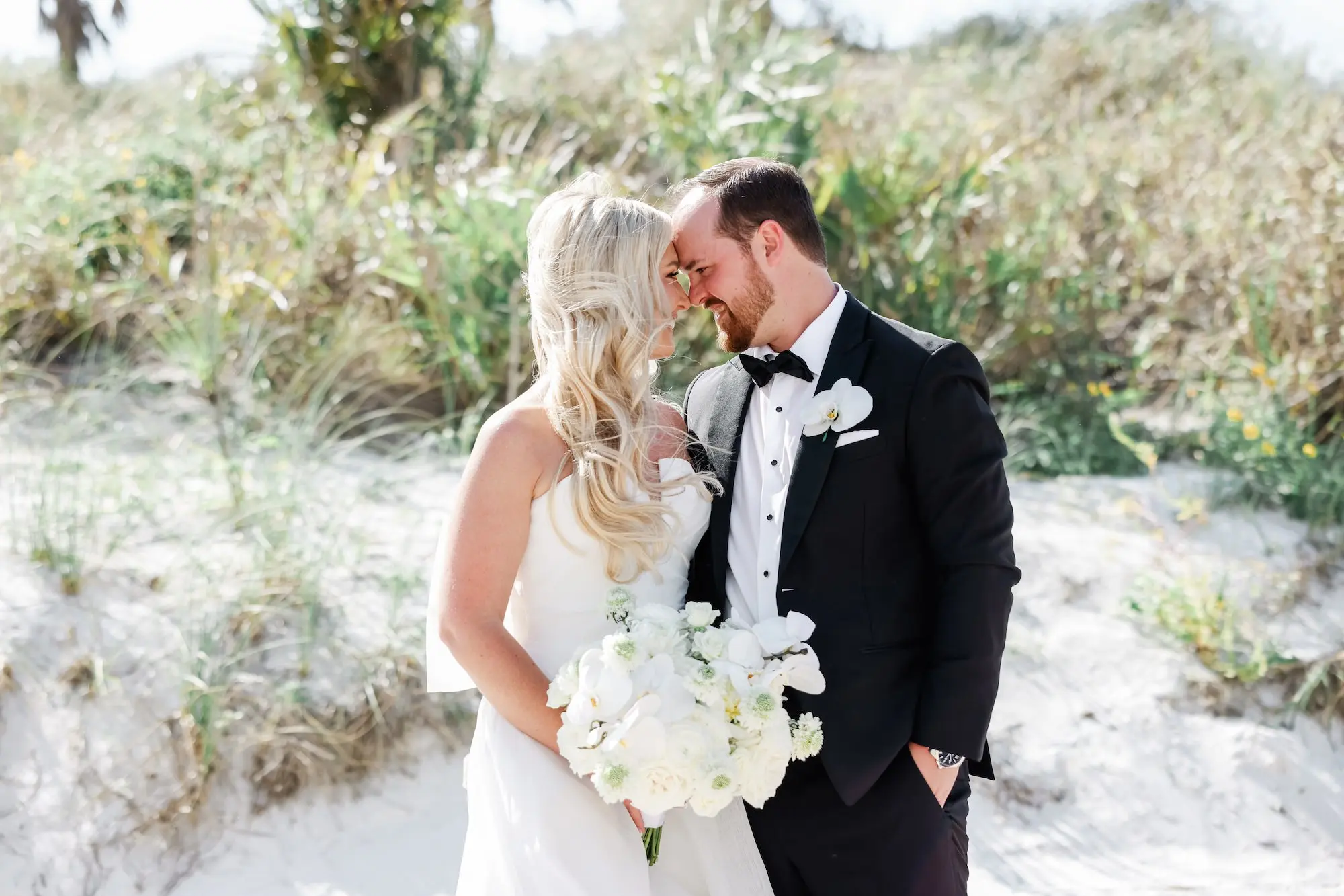 18Classic White Florida Wedding Ideas Venue Hyatt Clearwater Beach - Classic, White Rooftop Wedding | Hyatt Regency Clearwater Beach Bride and Groom Clearwater Beach Wedding Portrait | Monochromatic White Roses Bridal Bouquet Inspiration | Tampa Bay Photographer Lifelong Photography Studio
