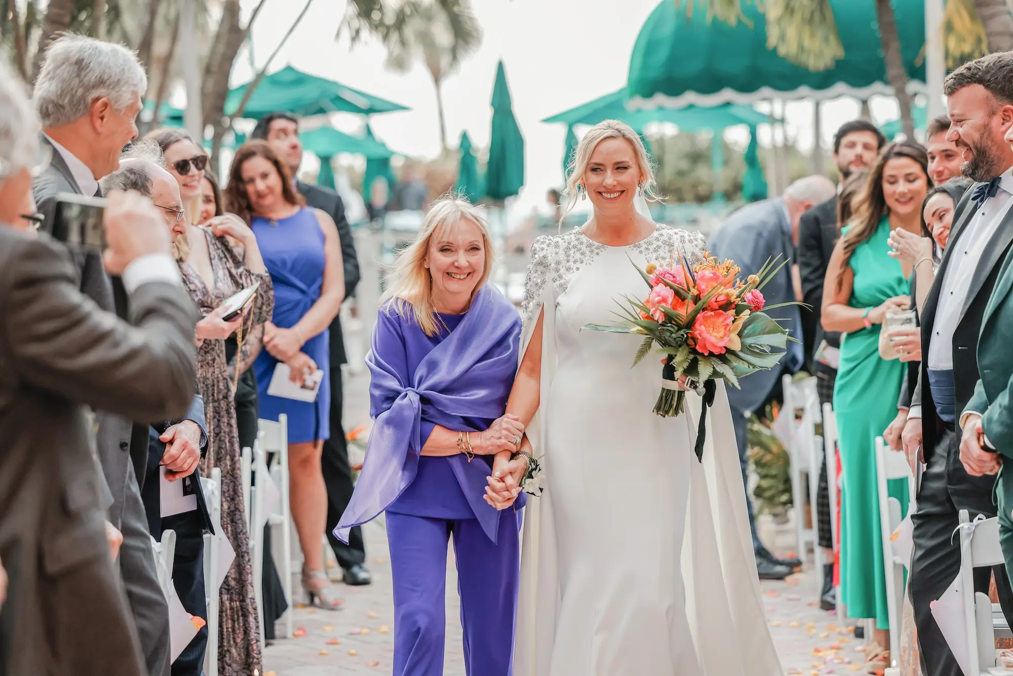 18Luxurious Vibrant Tropical Florida Wedding - Vibrant, Tropical St. Pete Beach Wedding | The Don CeSar Bride and Mother Walking Down Wedding Aisle