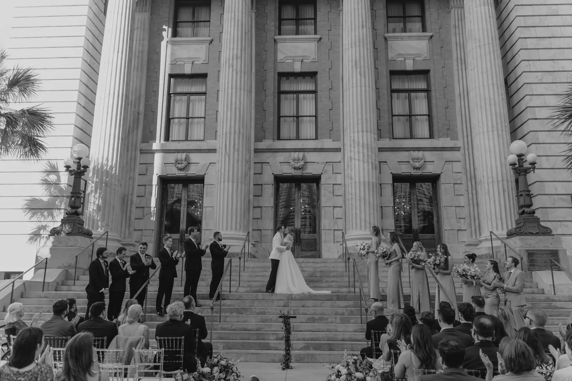 21Classic White Wedding Decor Ideas Tampa Venue Le Meriden - Classic, White Downtown Tampa Wedding | Le Méridien Bride and Groom First Kiss Wedding Portrait | Tampa Bay Event Venue Le Meridien | Photographer We The Blackwells
